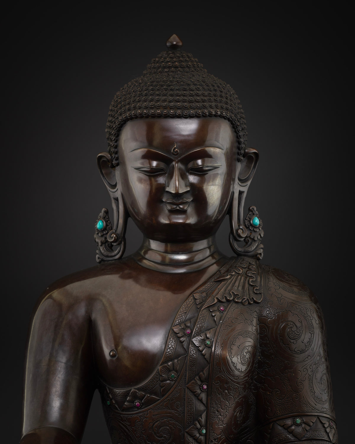 Shakyamuni Buddha Statue close up, detailed copper carving and robe