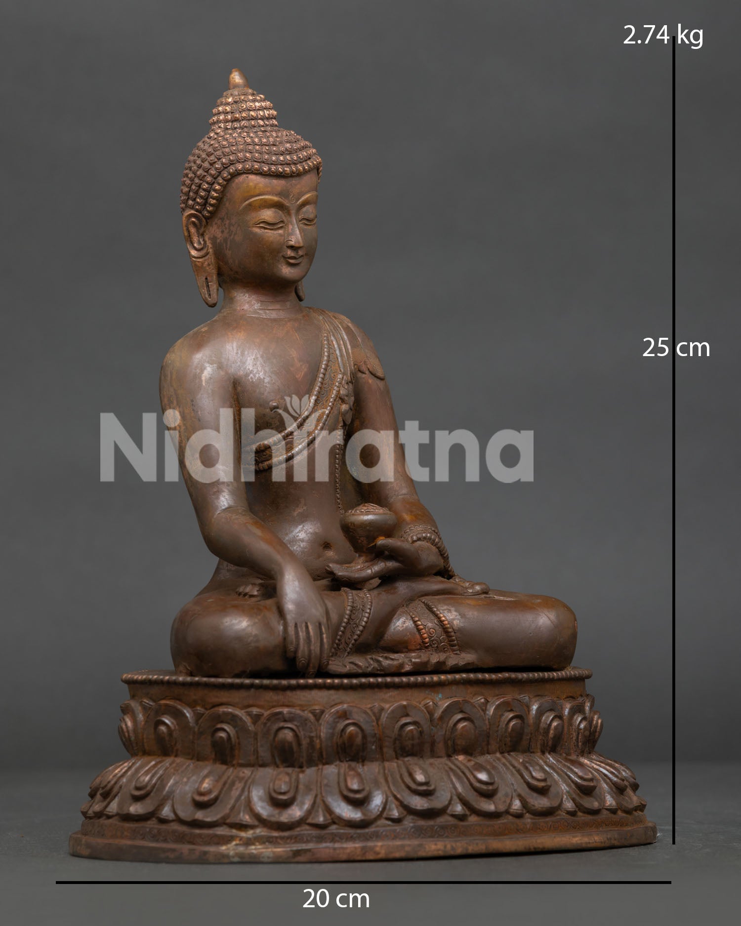 Shakyamuni Buddha statue close up with oxidized copper finish and double lotus pedestal.