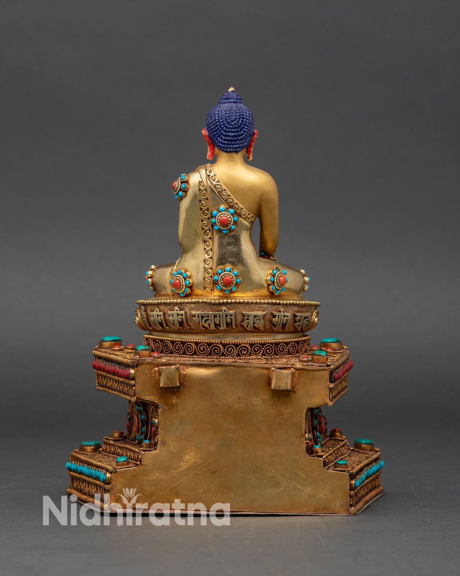 Shakyamuni Buddha statue, detail floral scrollwork beaded border turquoise coral inlay 24K gold gilded Himalayan sculpture