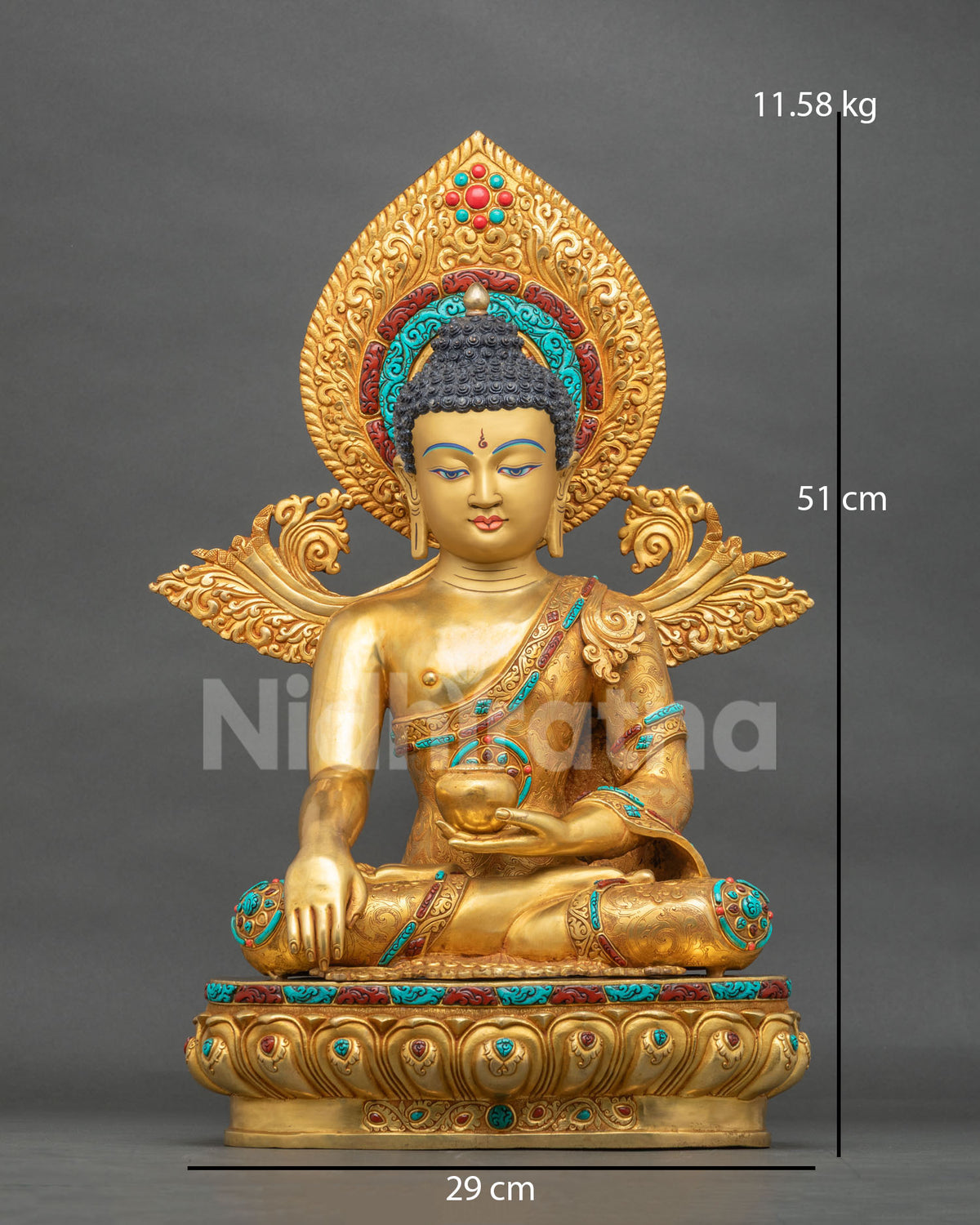 Shakyamuni Buddha statue from Nepal in 24K gold gilded copper, front view with halo and lotus base