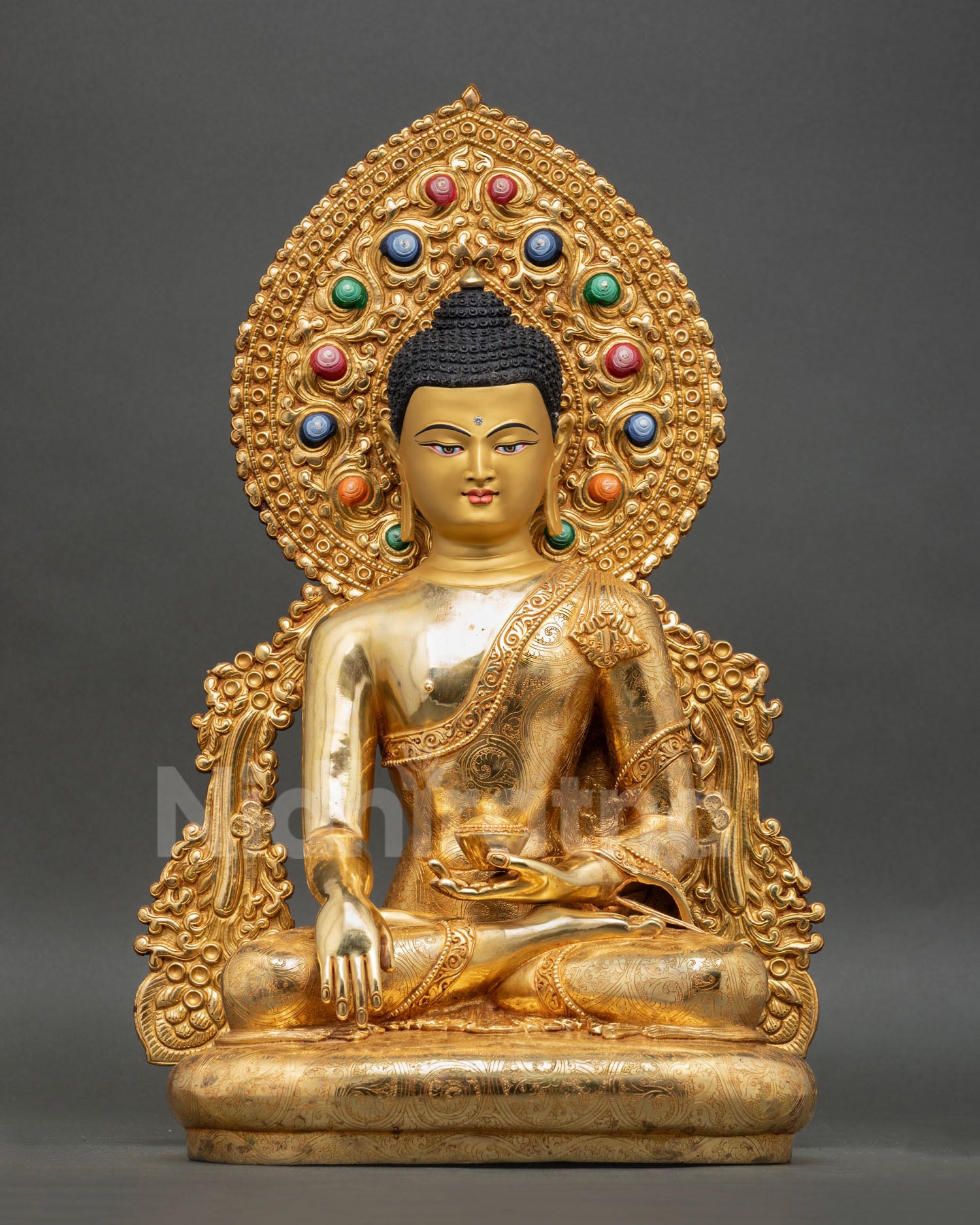 Shakyamuni Buddha statue front view, 24K gold fire-gilded Buddhist art from Nepal