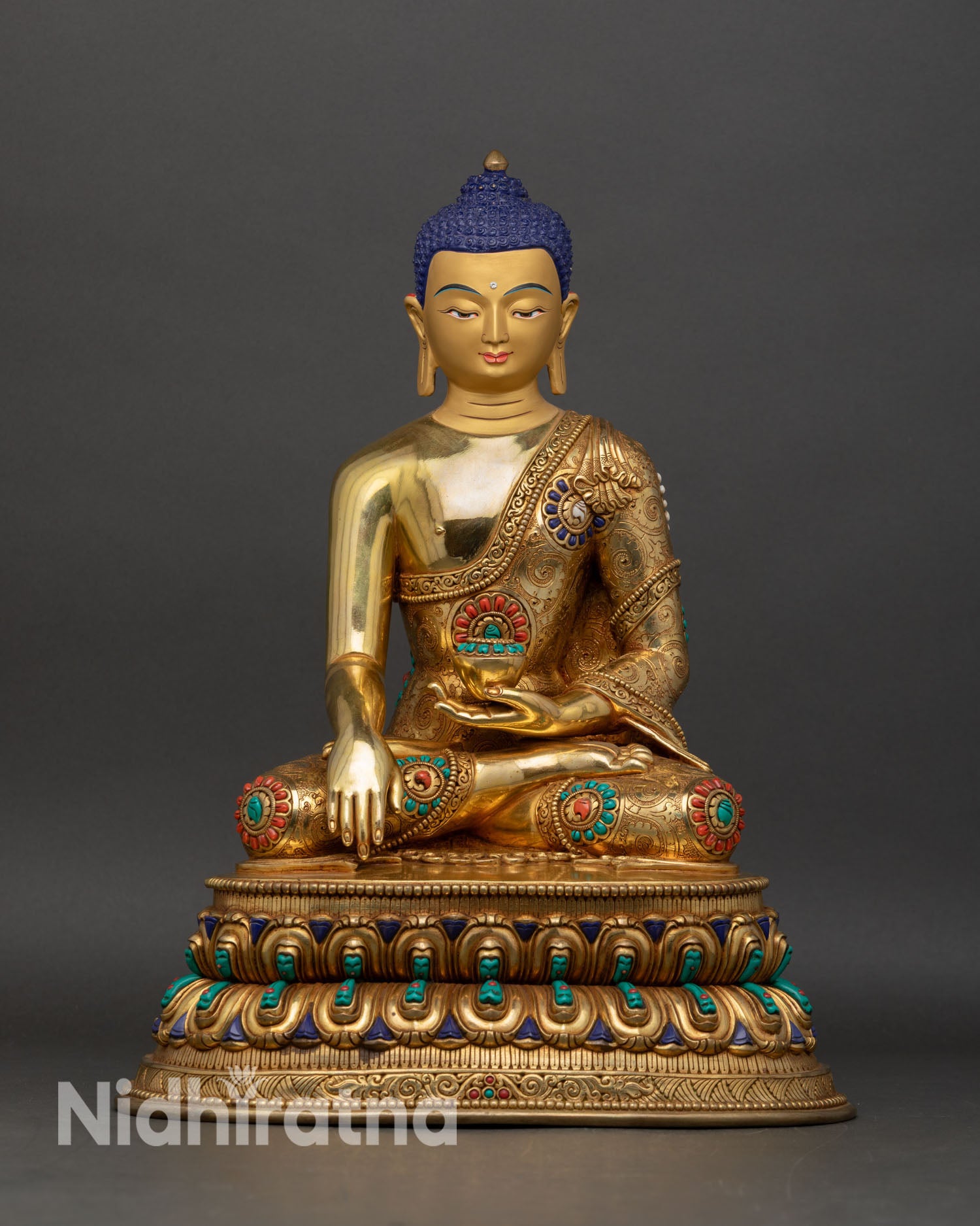 Shakyamuni Buddha statue front view in gold gilded copper with bhumisparsha mudra handmade in Nepal
