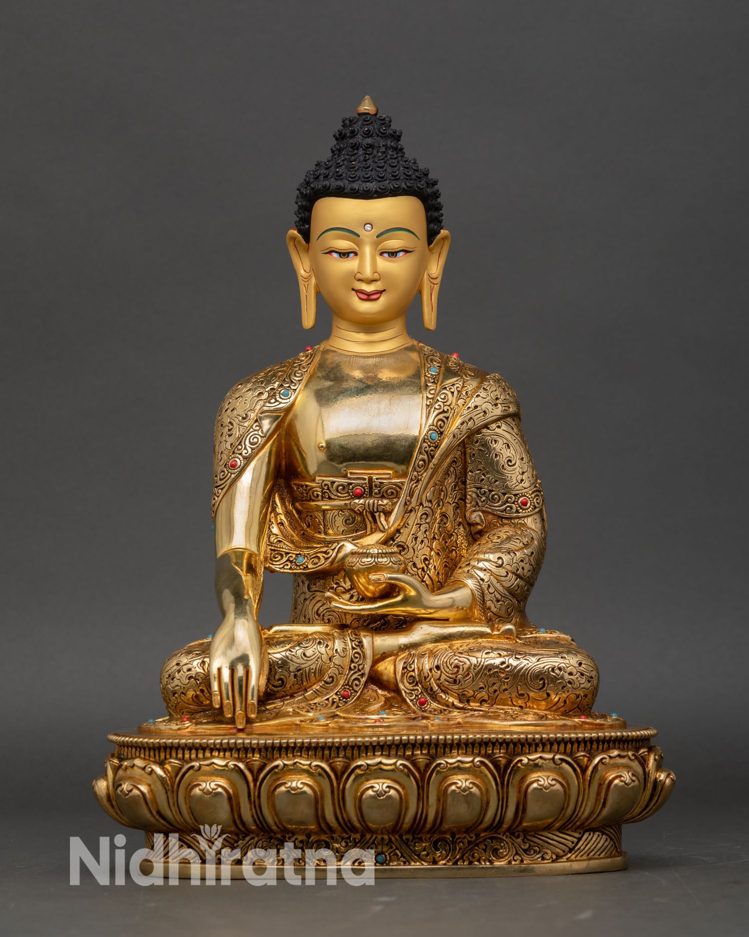 Shakyamuni Buddha statue front view, gold gilded Nepalese handcrafted sculpture