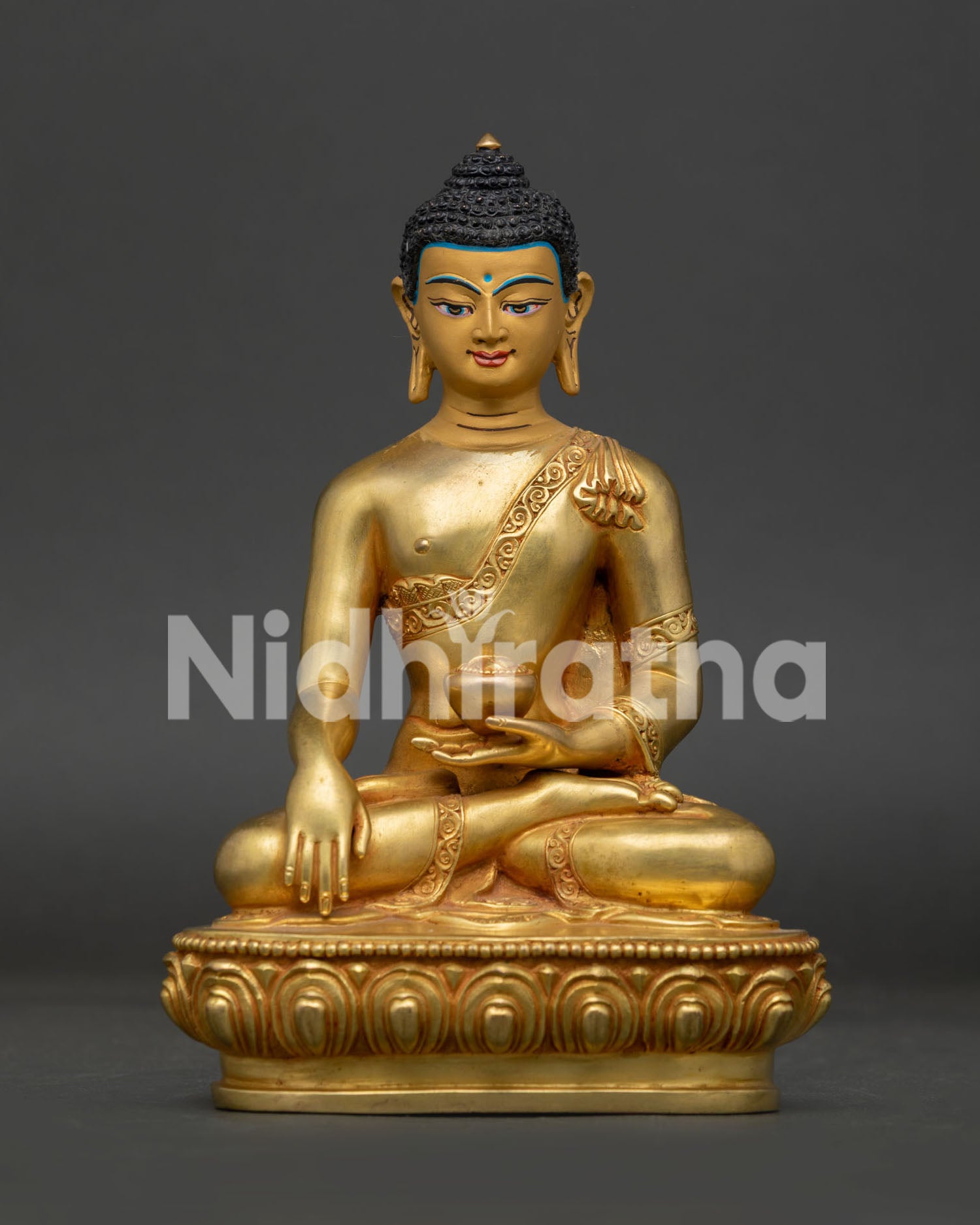 Shakyamuni Buddha statue front view handcrafted copper gold gilded with gold painted face.