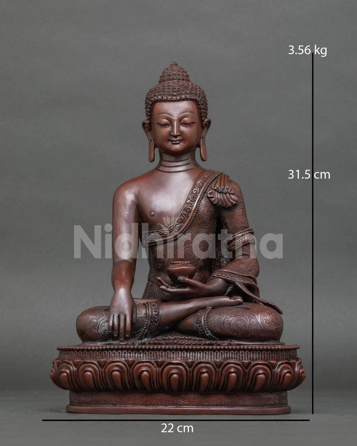Shakyamuni buddha statue handcrafted by newari artist in patan nepal with oxidized copper finish.