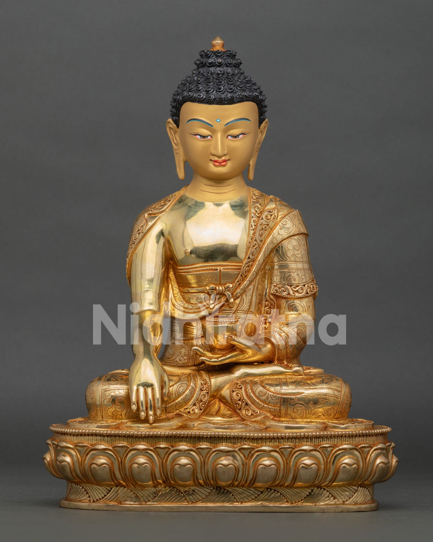 shakyamuni buddha statue handcrafted in nepal with gold gilding on lotus throne