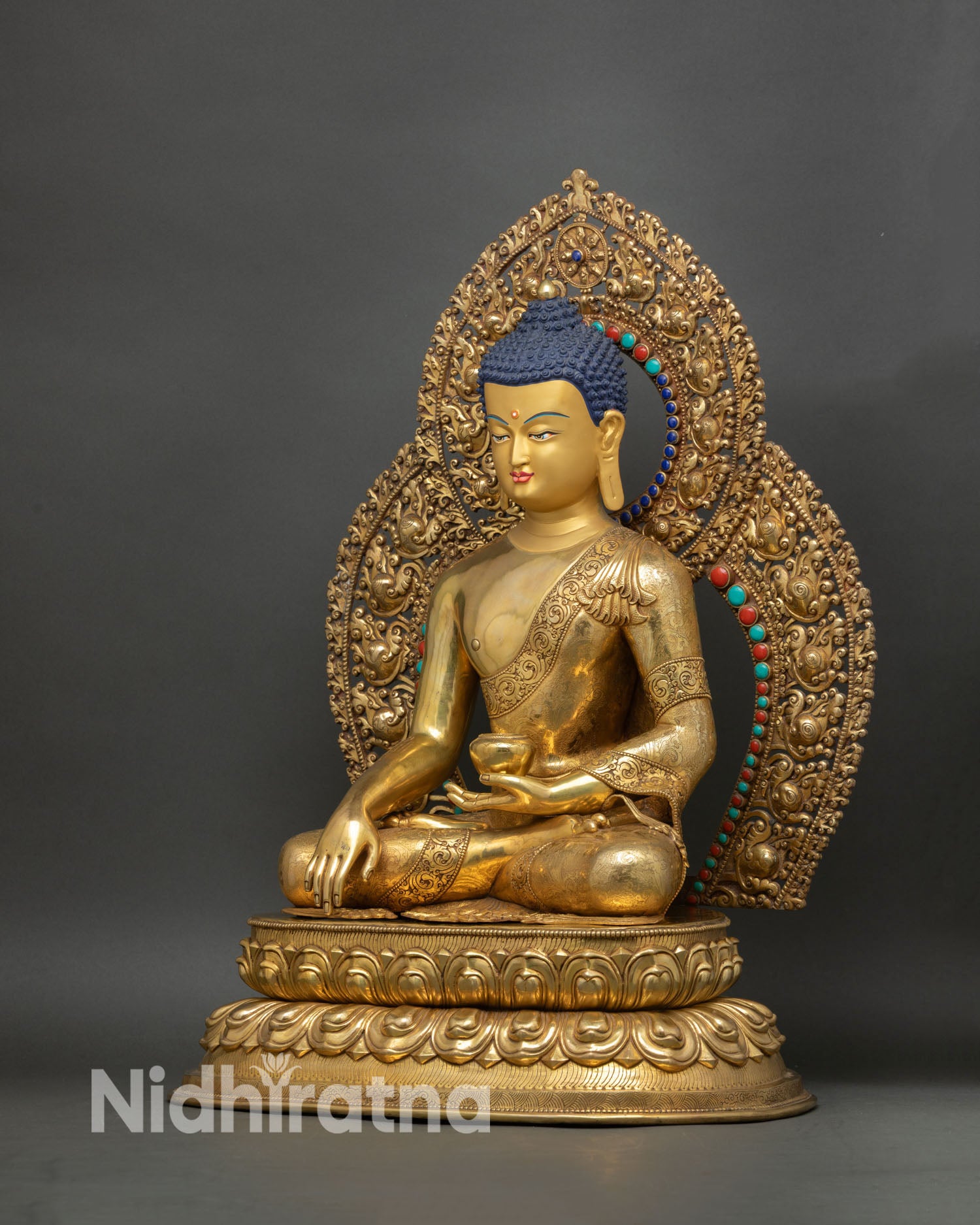 Left side view Shakyamuni Buddha statue, traditional Nepalese lost wax cast Buddhist sculpture with rich detailing