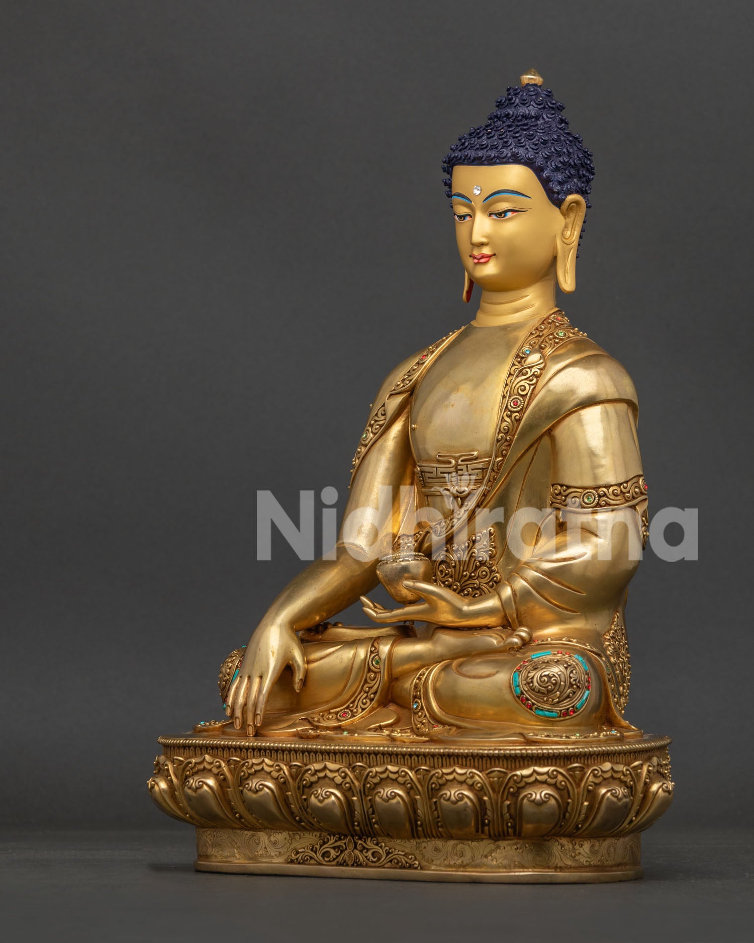 Shakyamuni Buddha Statue left view side showing lotus seat and gilded finish