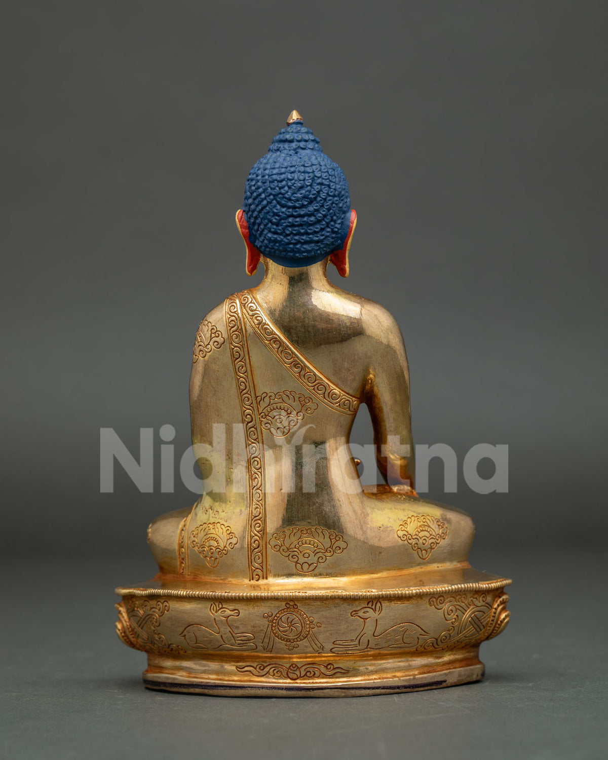 Shakyamuni Buddha statue seated on hand carved lotus pedestal for Buddhist altar.