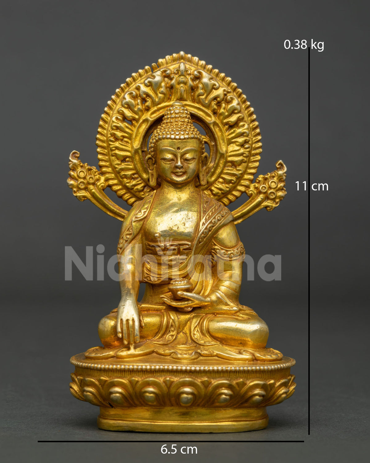 Shakyamuni Buddha statue seated on handcarved lotus pedestal with ornate halo.
