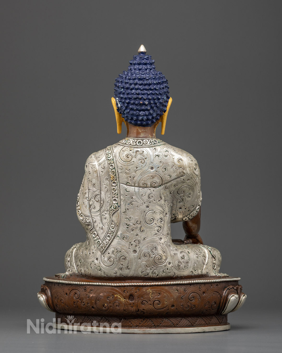 Shakyamuni Buddha statue seated on lotus pedestal for Buddhist meditation altar