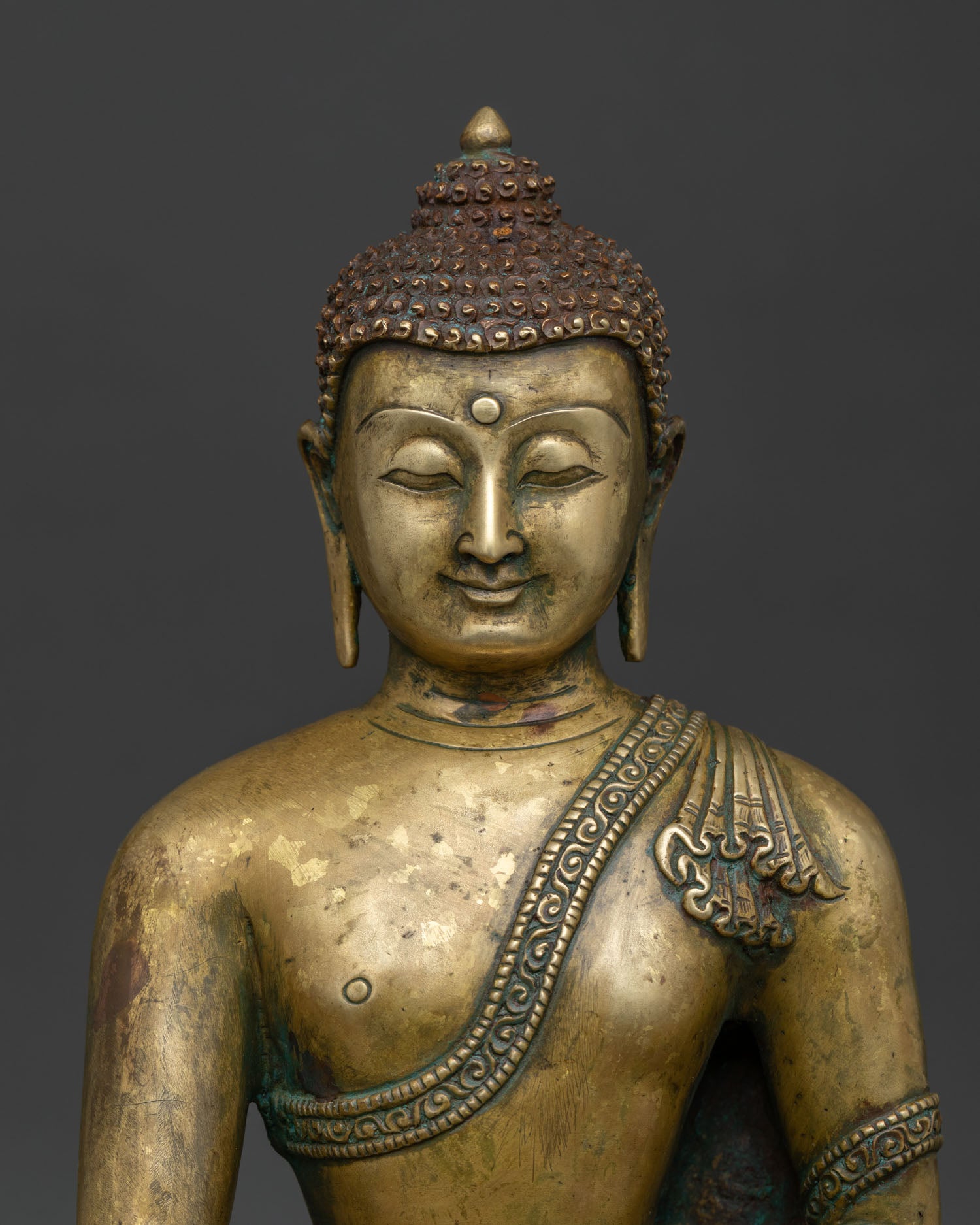 Shakyamuni Buddha Statue Serene Face Antique Finish Close Up.