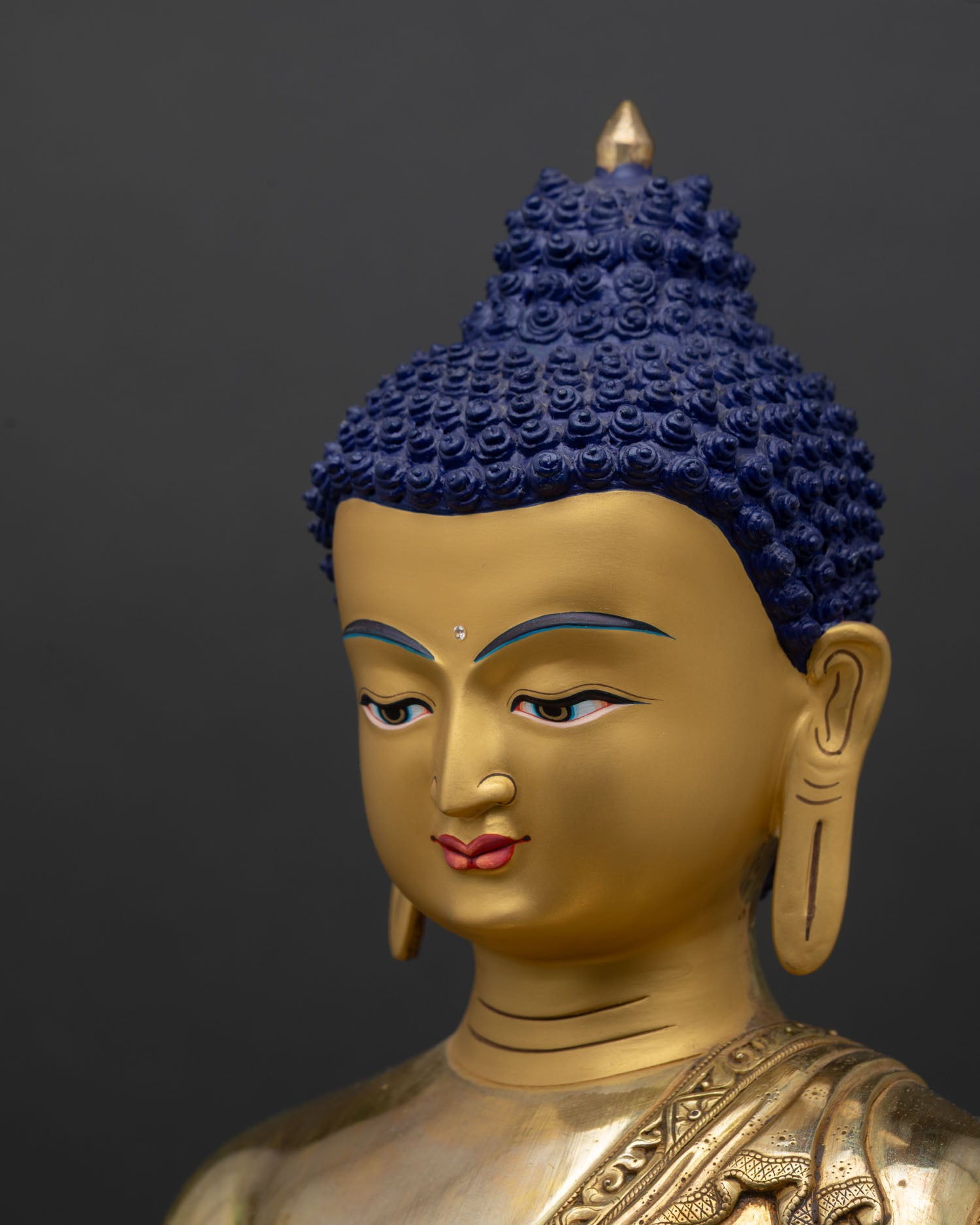Shakyamuni Buddha statue side close-up detailed copper robes lotus petals craftsmanship