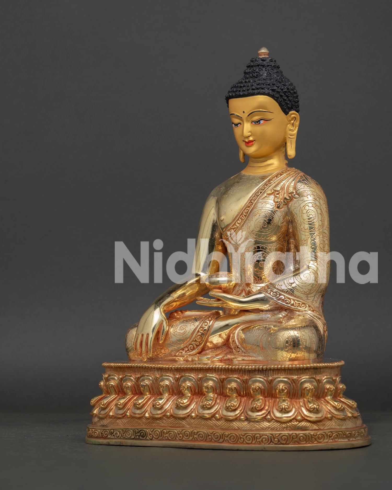 Shakyamuni Buddha Statue Side View on Double Lotus Pedestal with Traditional Begging Bowl.