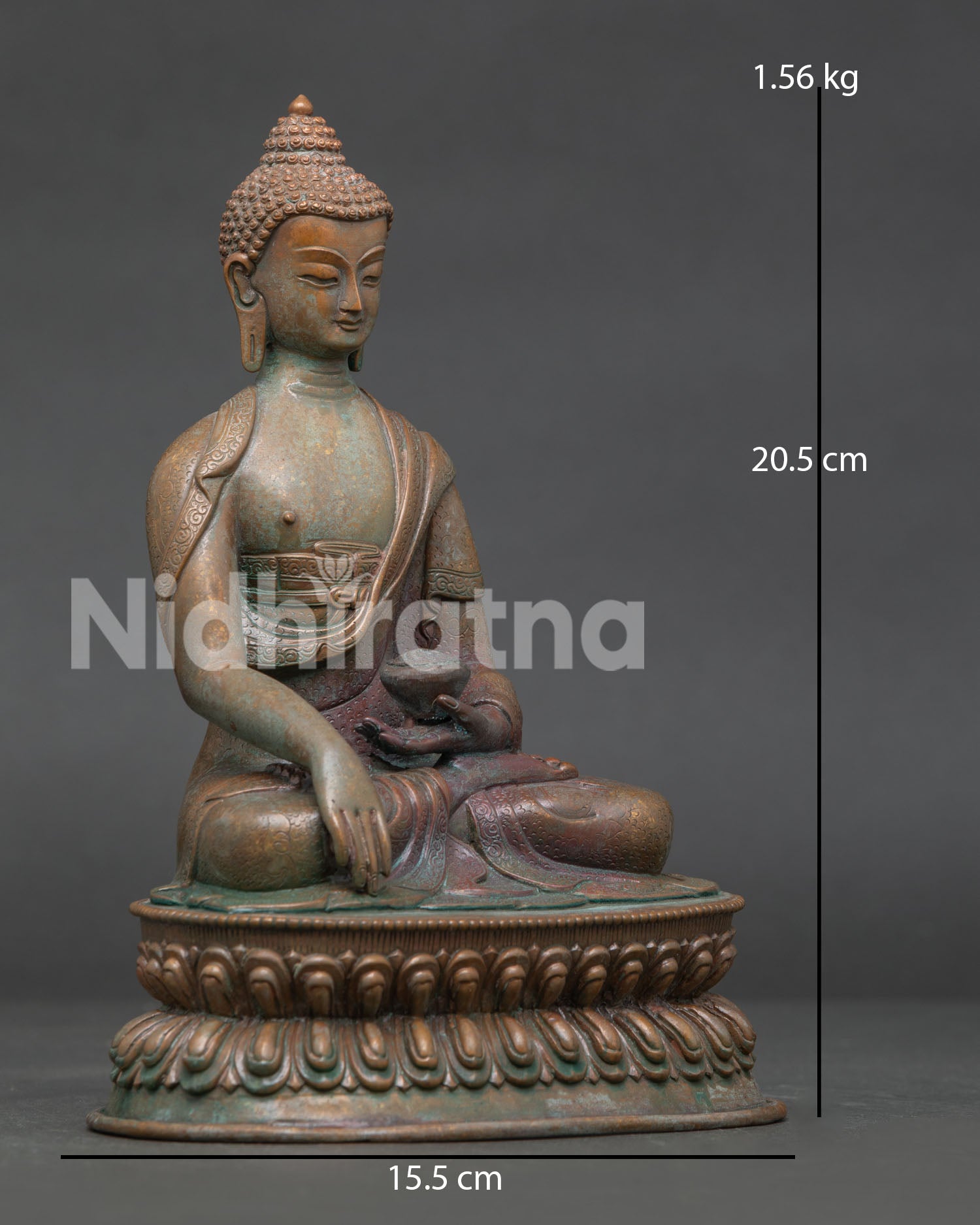 Shakyamuni Buddha statue with oxidized copper finish and double lotus pedestal.