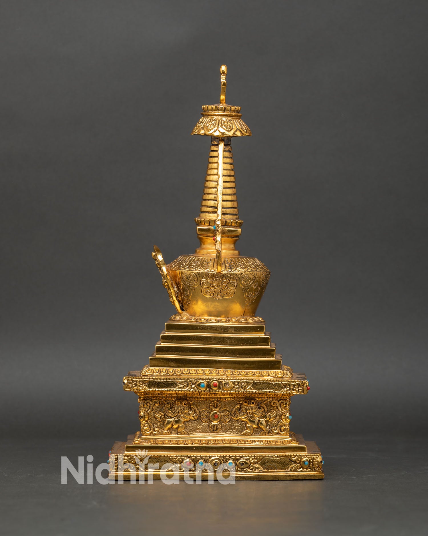 shakyamuni buddha stupa side view sacred gold plated copper dharma center meditation art