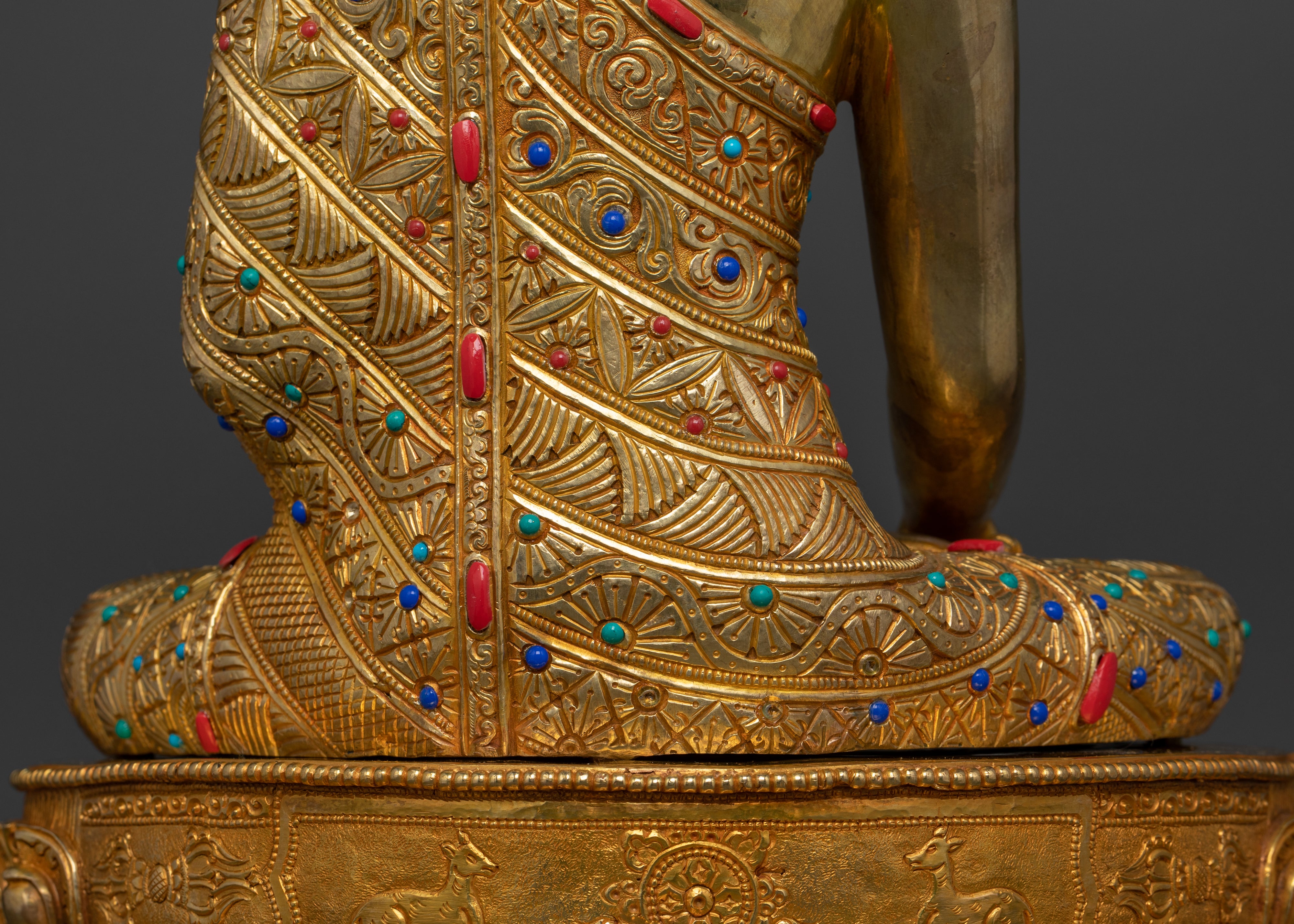 the lower back part of gold plated shakyamuni buddha