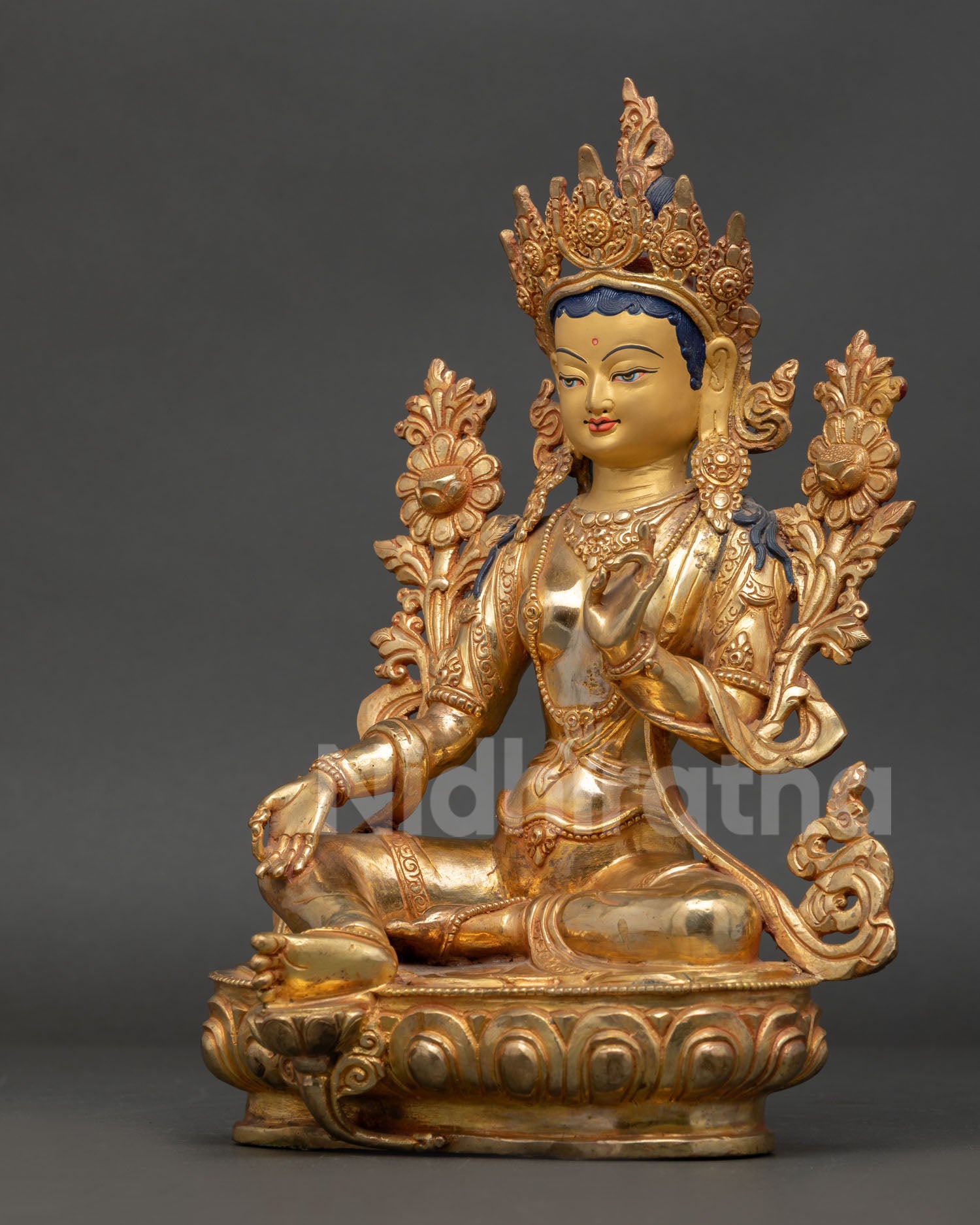 Side view of Green Tara detailed ornaments, five-jeweled crown, and flowing jewelry reflect sacred Buddhist artistry.