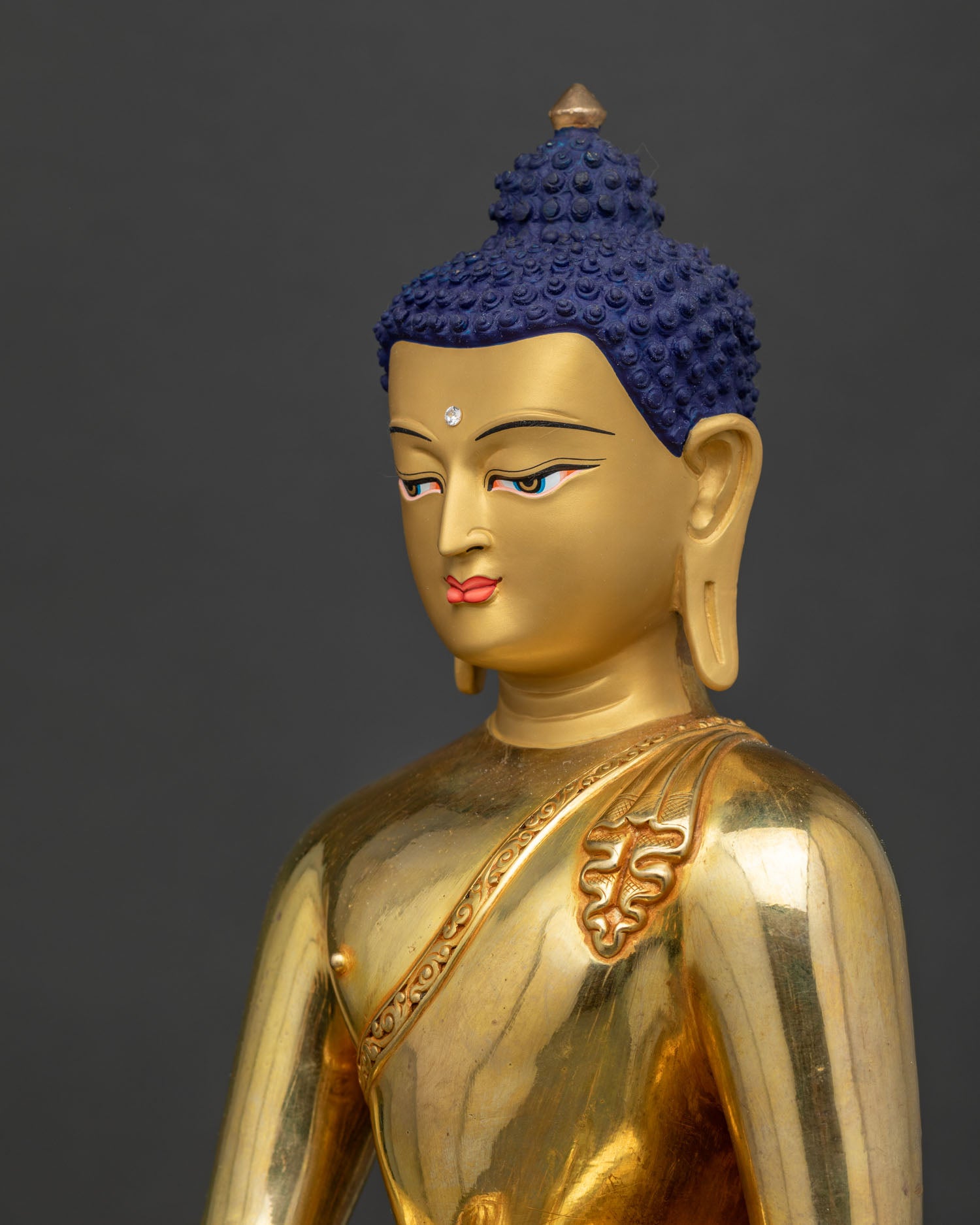 Side close-up of Shakyamuni Buddha, gilded robe draping, lotus throne detailing, Nepali lost-wax casting