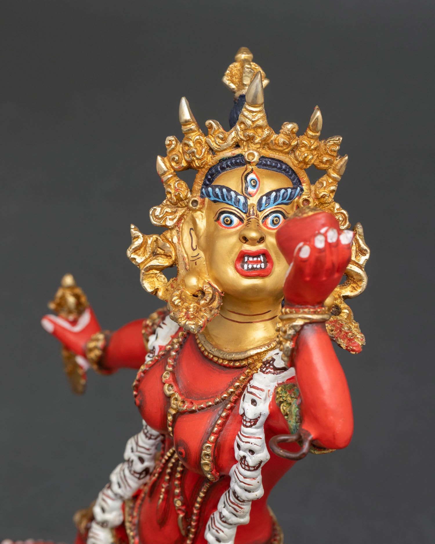 side close up Vajrayogini statue dynamic posture lotus seat flaming aura copper craftsmanship