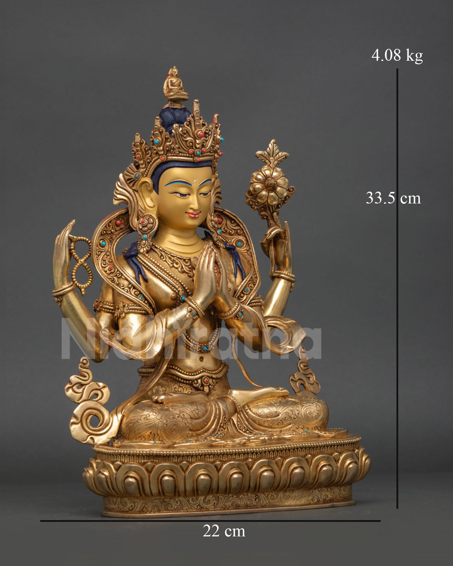Side view of Chenrezig sculpture, copper and gold gilded Buddhist deity, flowing details, meditation statue, Nepal artwork