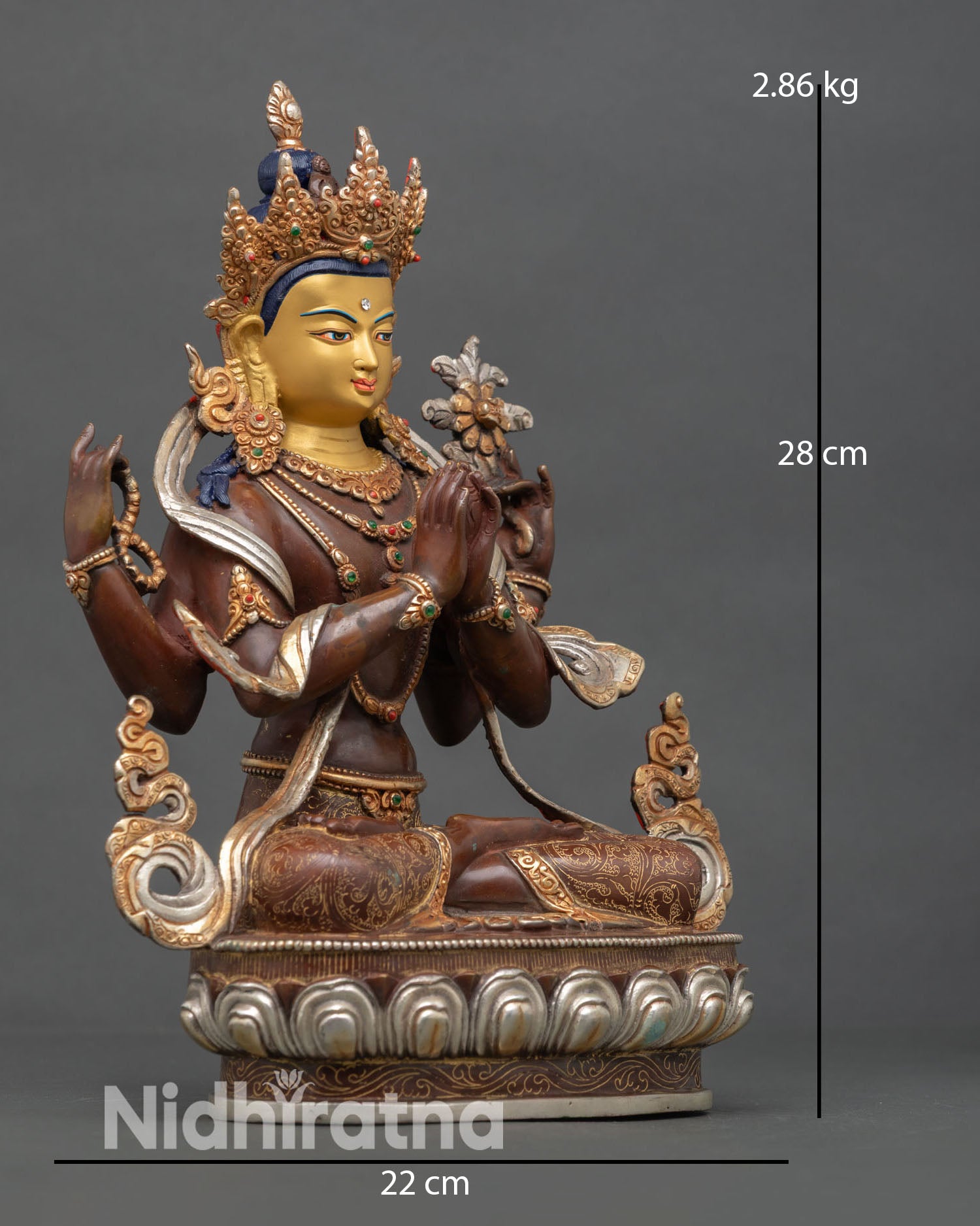 Side view of Chenrezig statue, four arms symbolizing compassion and wisdom copper metal finish with intricate Himalayan artisan detailing meditation art
