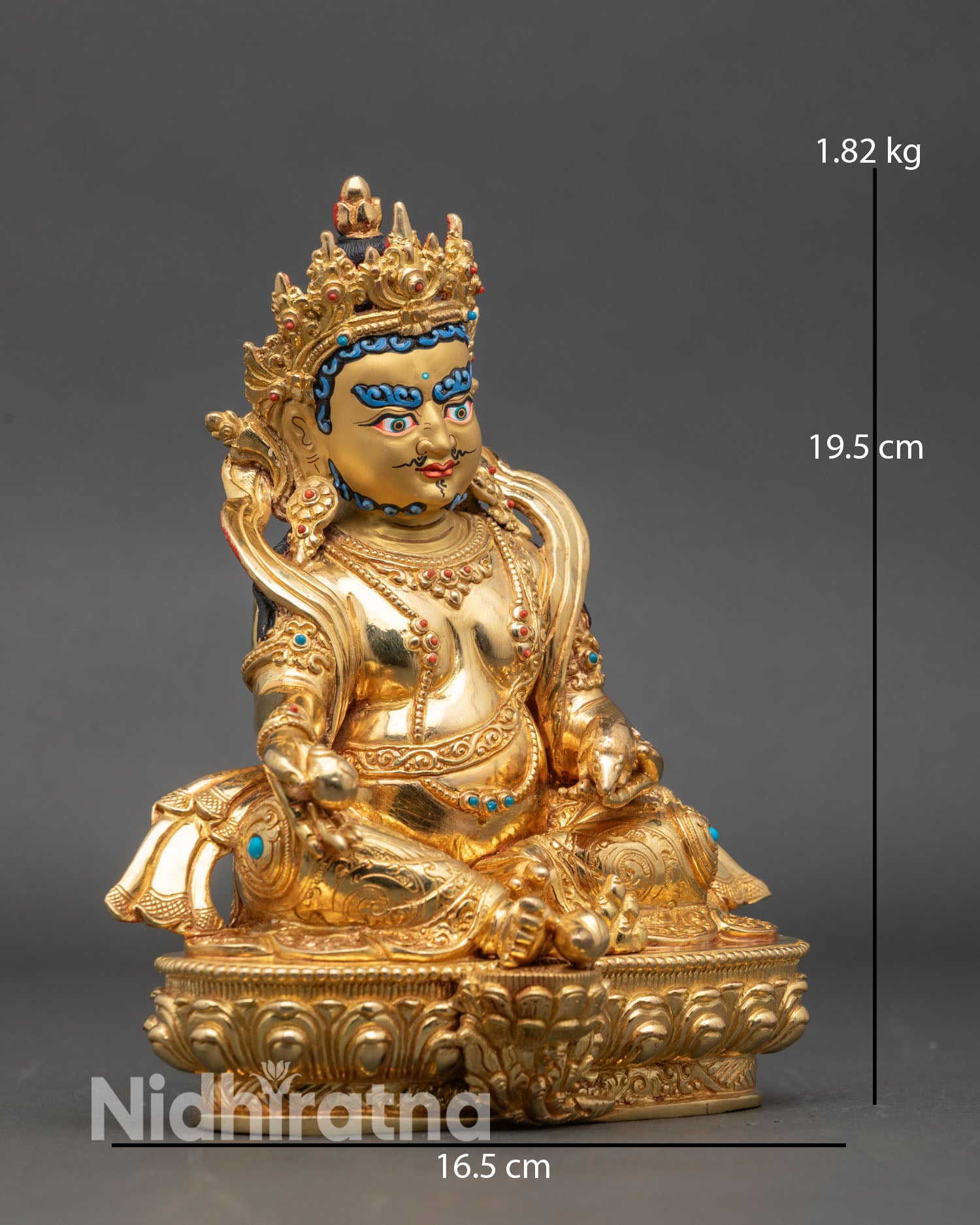 Side view Dzambhala statue lotus pedestal mongoose conch shell sacred art