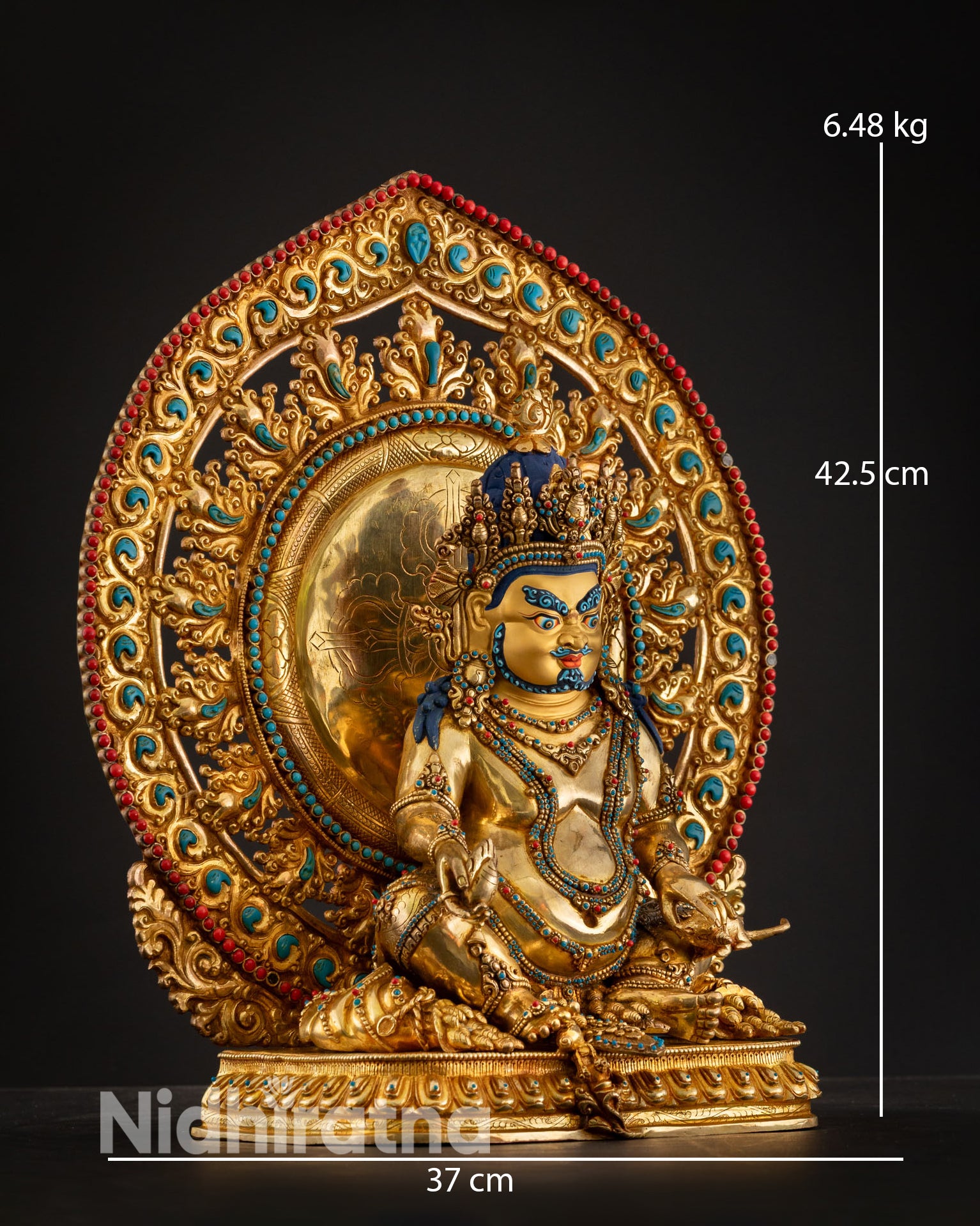 Side view of Dzambhala wealth deity statue, copper, gold gilded, Nepal handmade