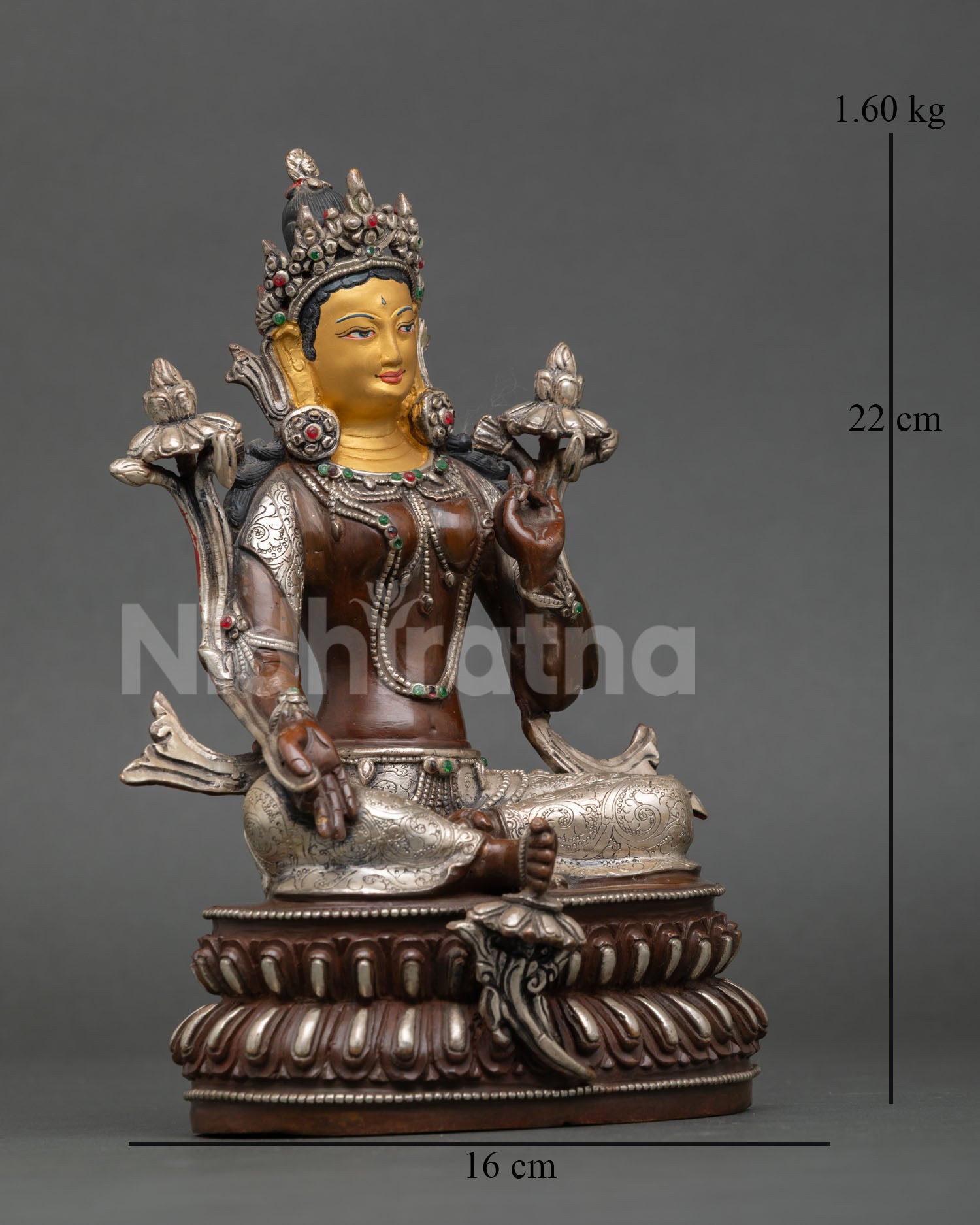 Side view of Green Tara meditation statue seated on double lotus pedestal Varada Mudra, Abhaya Mudra, silver-plated copper finish
