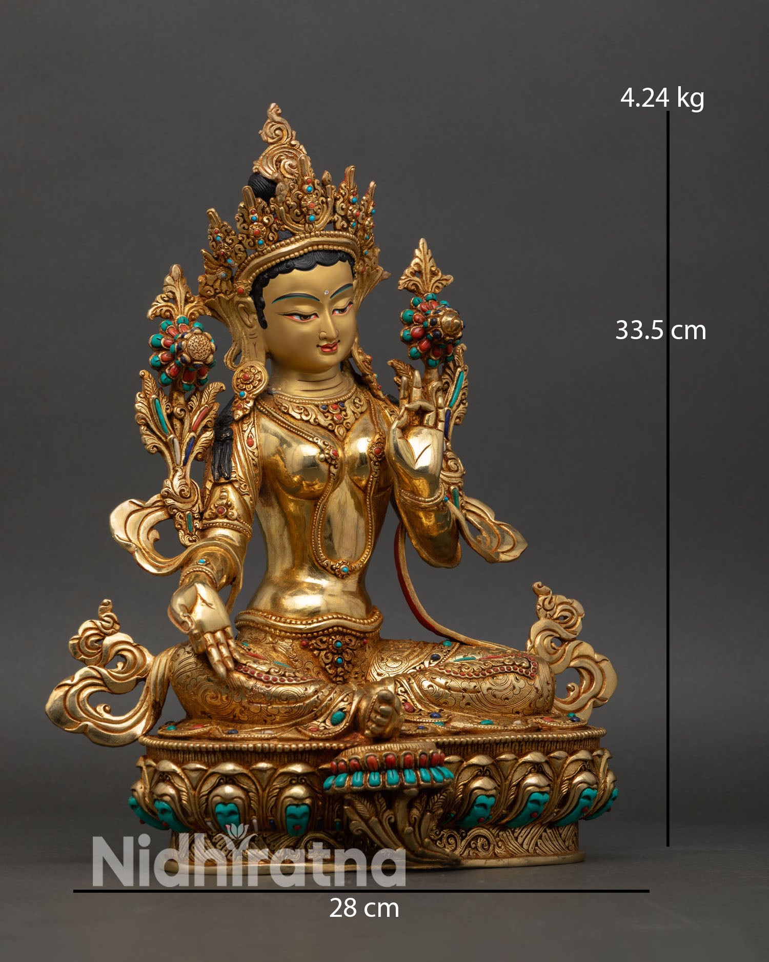 Side view of green tara statue lotus pedestal extended right foot lost wax casting nepal artisan craft