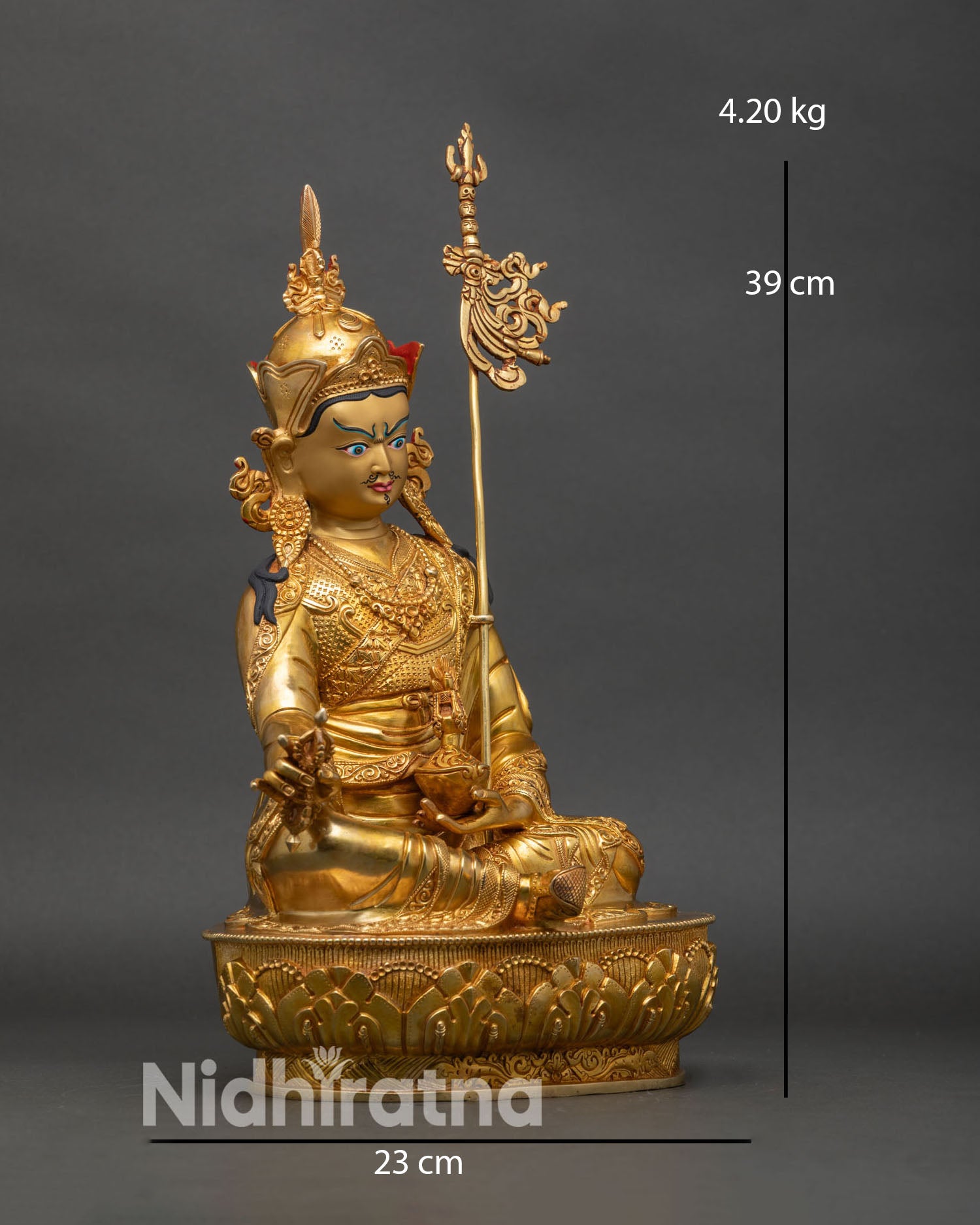 Side view Guru Rinpoche statue lotus throne vajra skull cup trident staff spiritual decor