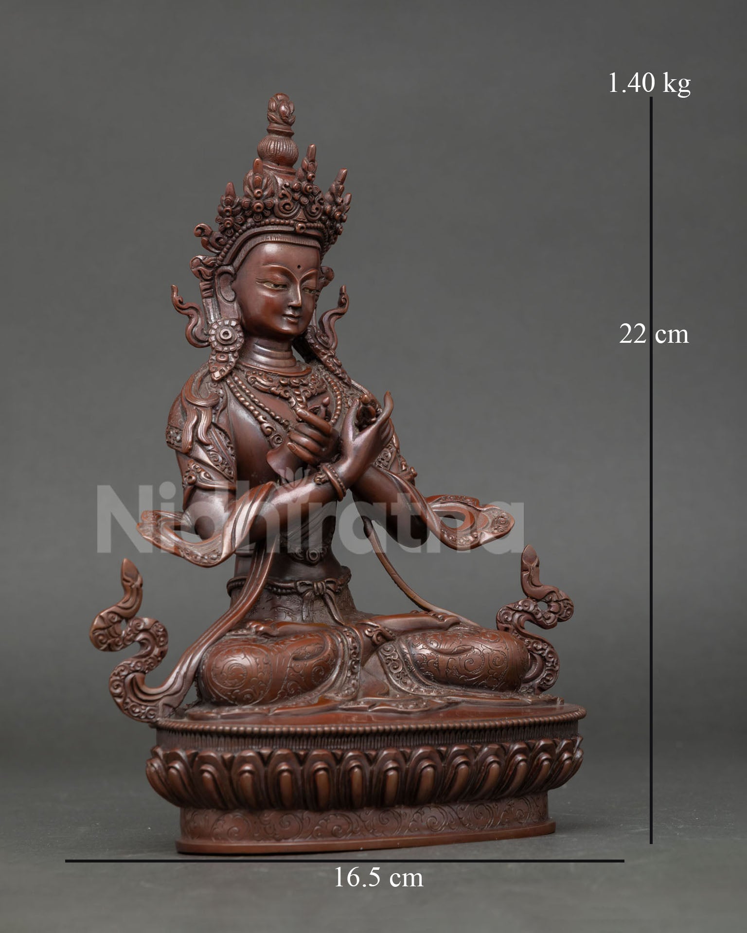Side view of handcrafted Vajradhara sculpture with oxidized copper finish, traditional Himalayan Buddhist artistry for spiritual space.
