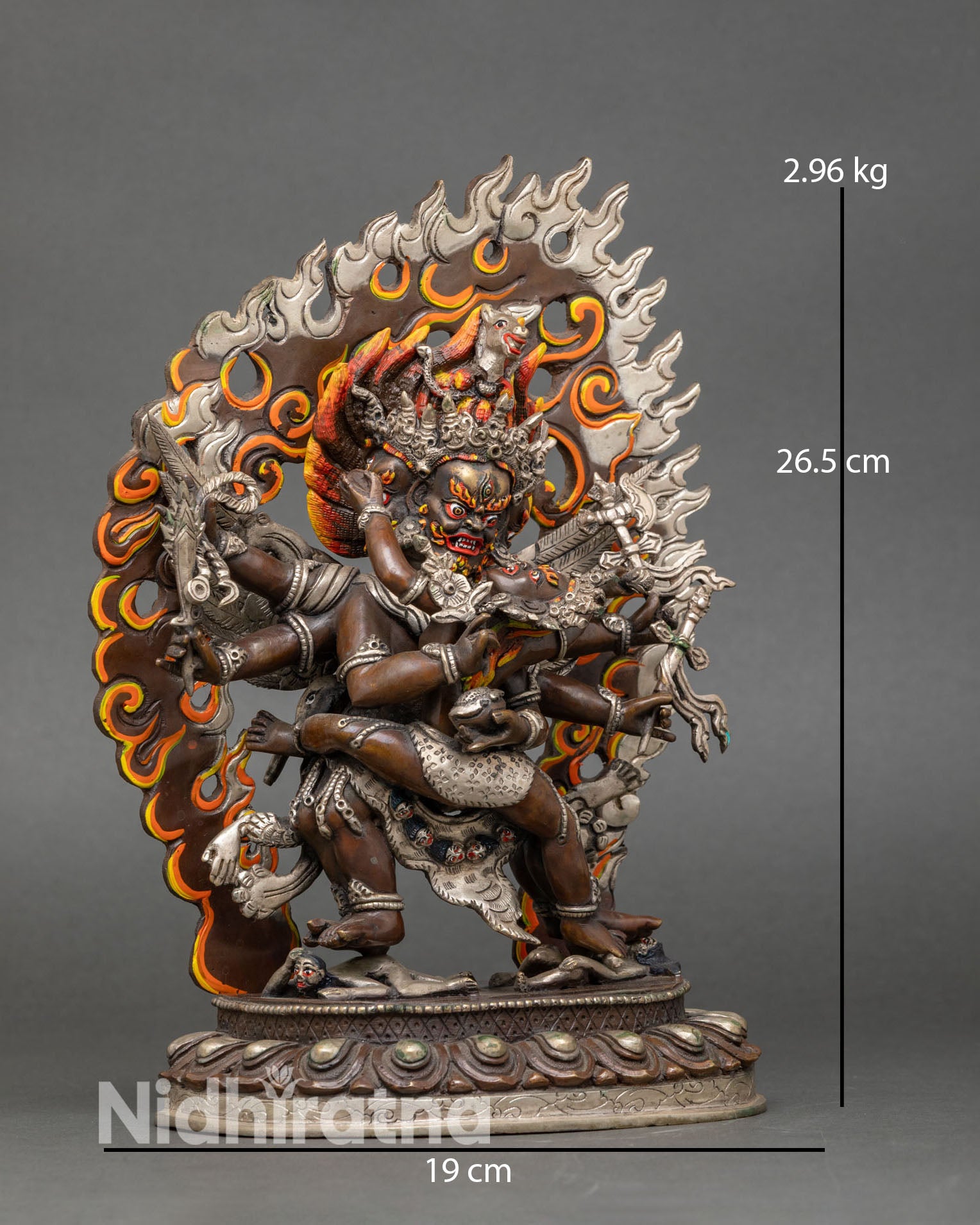 Side view of Hayagriva statue wings feathers sword vajra lasso Himalayan craftsmanship