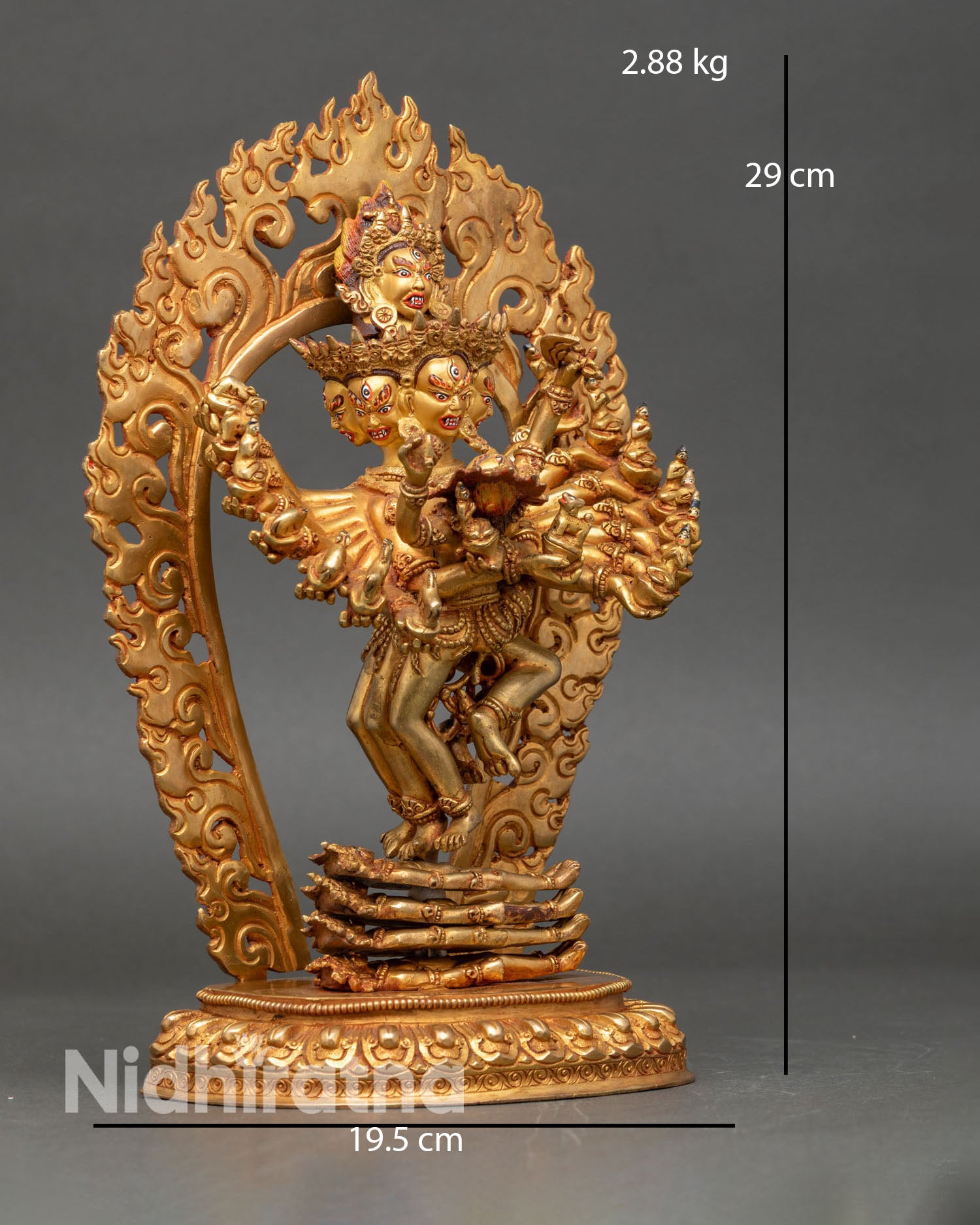 Side view of Hevajra statue tantric union posture sun disc lotus seat dynamic wrathful deity sculpture Tibetan Buddhist ritual art
