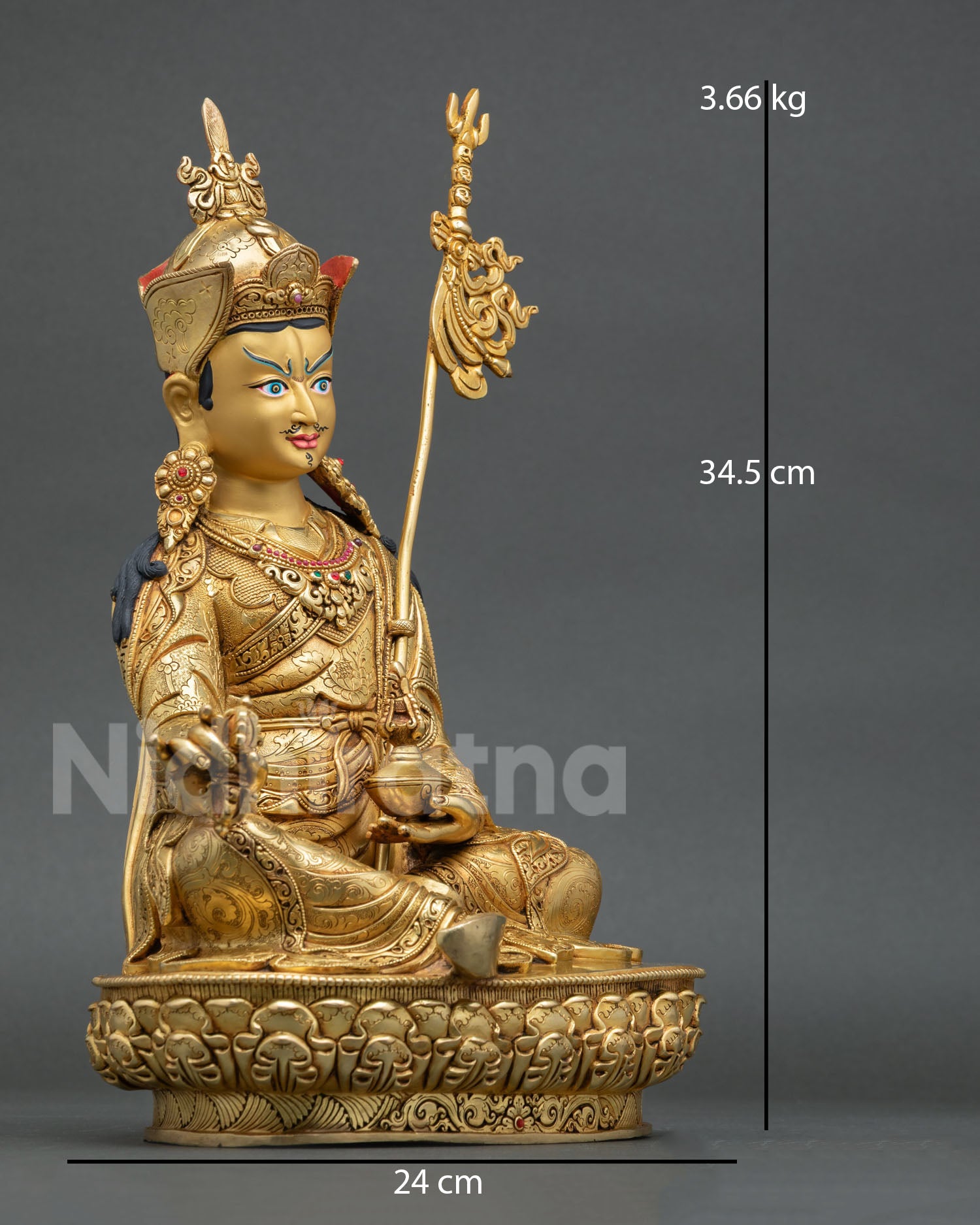 Side view of Himalayan Guru Rinpoche copper statue with lost wax casting intricate robes and sacred ornaments