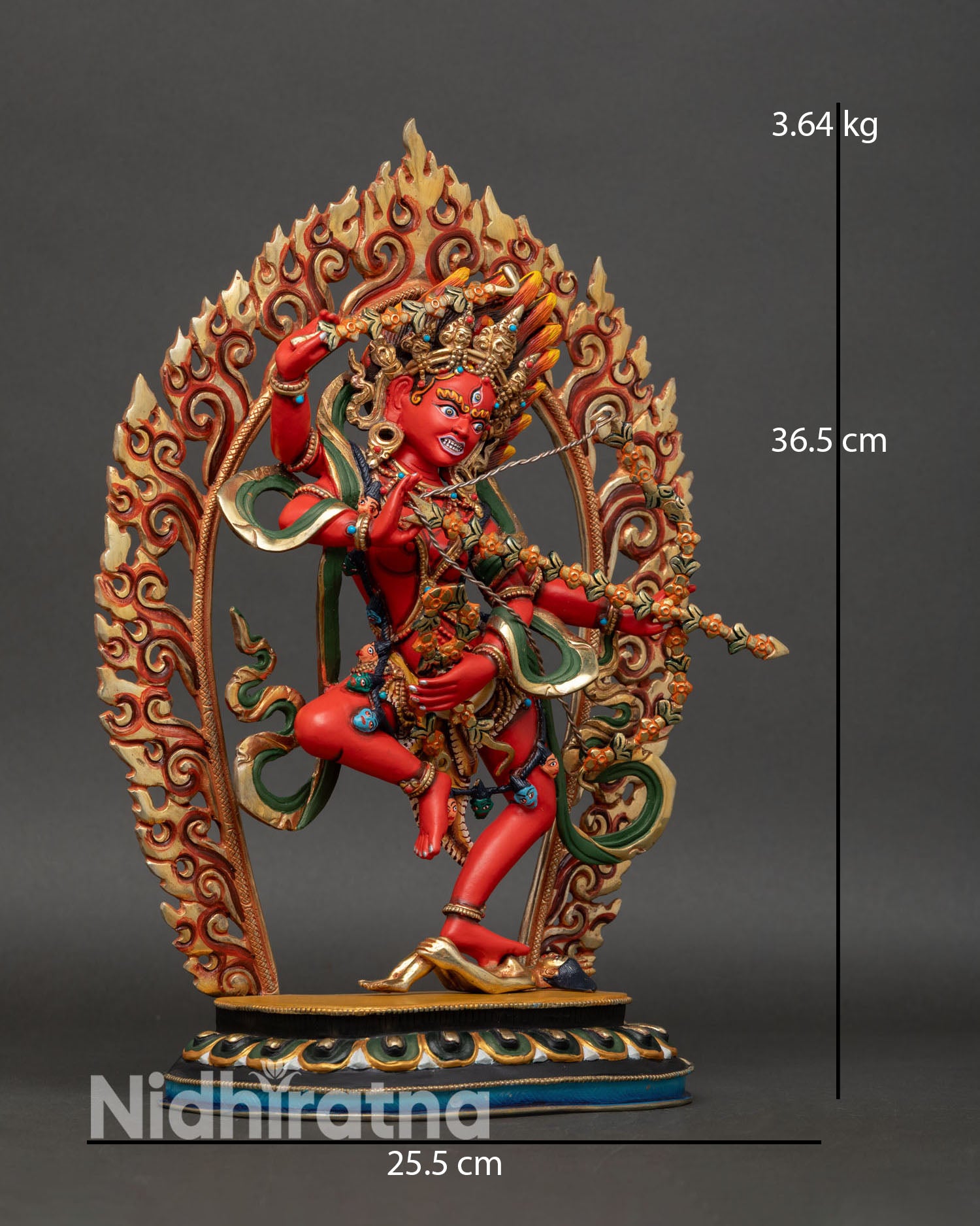Side view of Kurukulla statue dynamic posture standing on lotus seat with flaming halo copper ritual sculpture