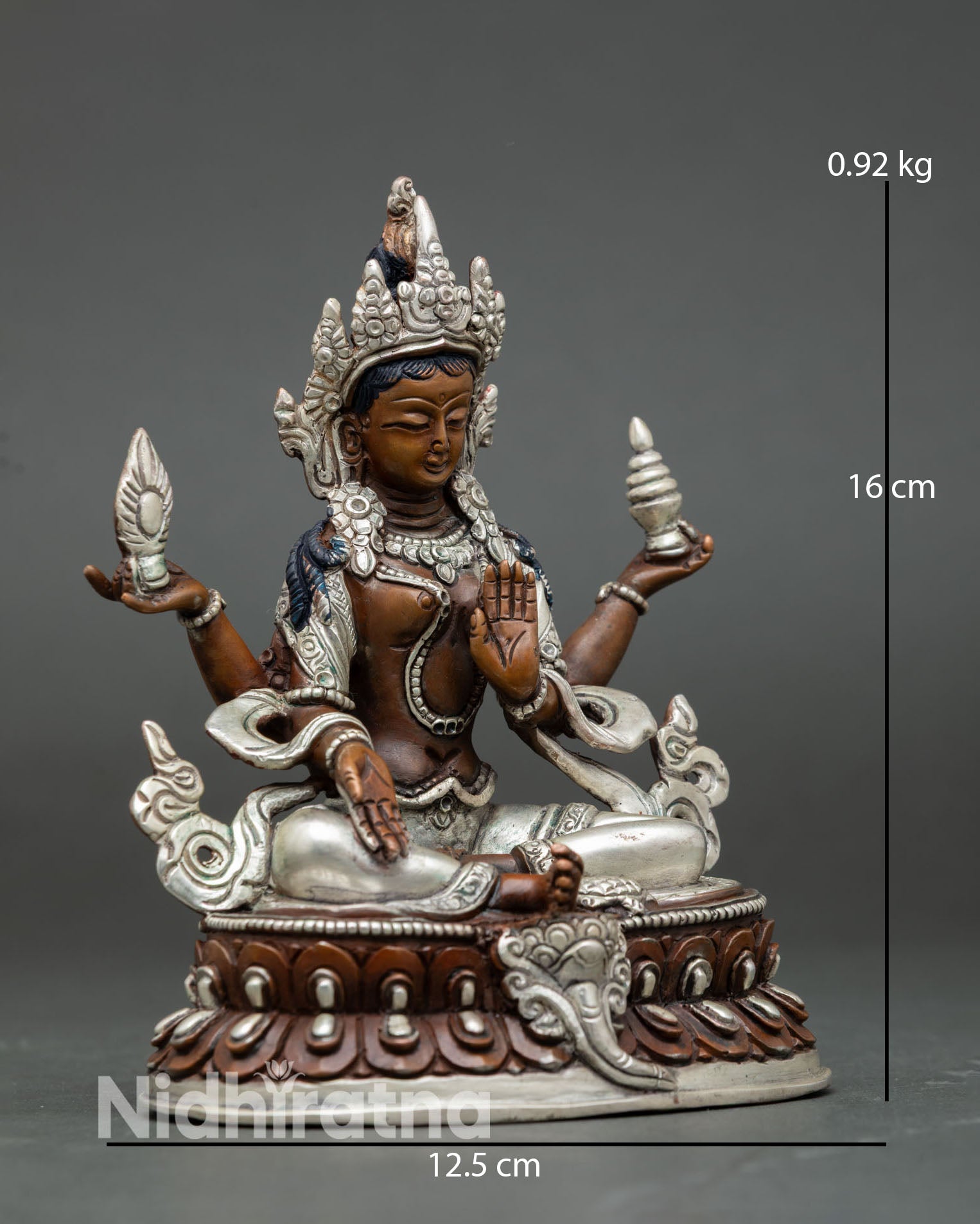 Side view of Laxmi goddess sculpture seated on lotus throne handcrafted Hindu prosperity and abundance altar decor