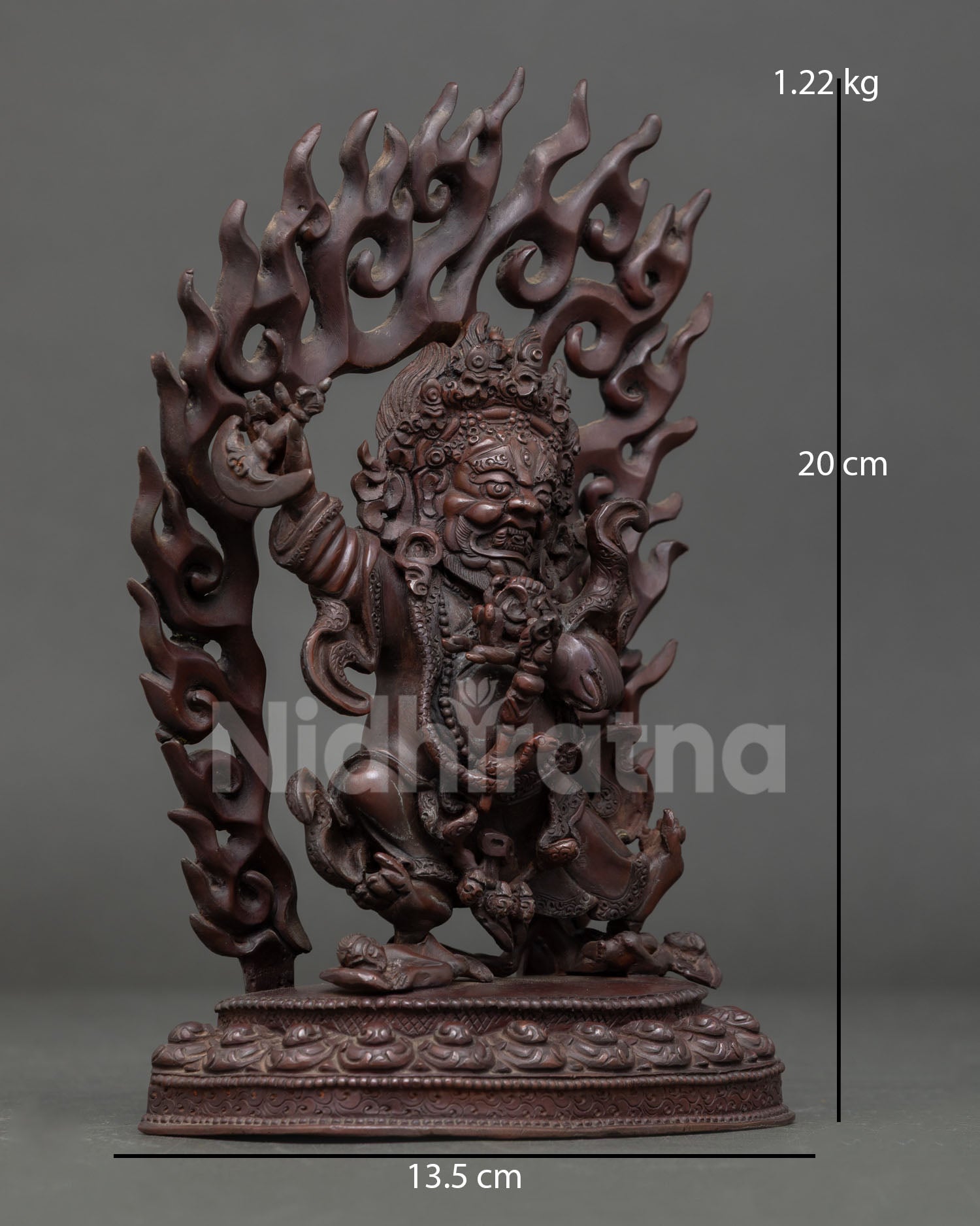Side view of Mahakala Bernagchen statue Dharma protector deity from Karma Kagyu lineage, copper sculpture with intricate traditional Nepalese artistry