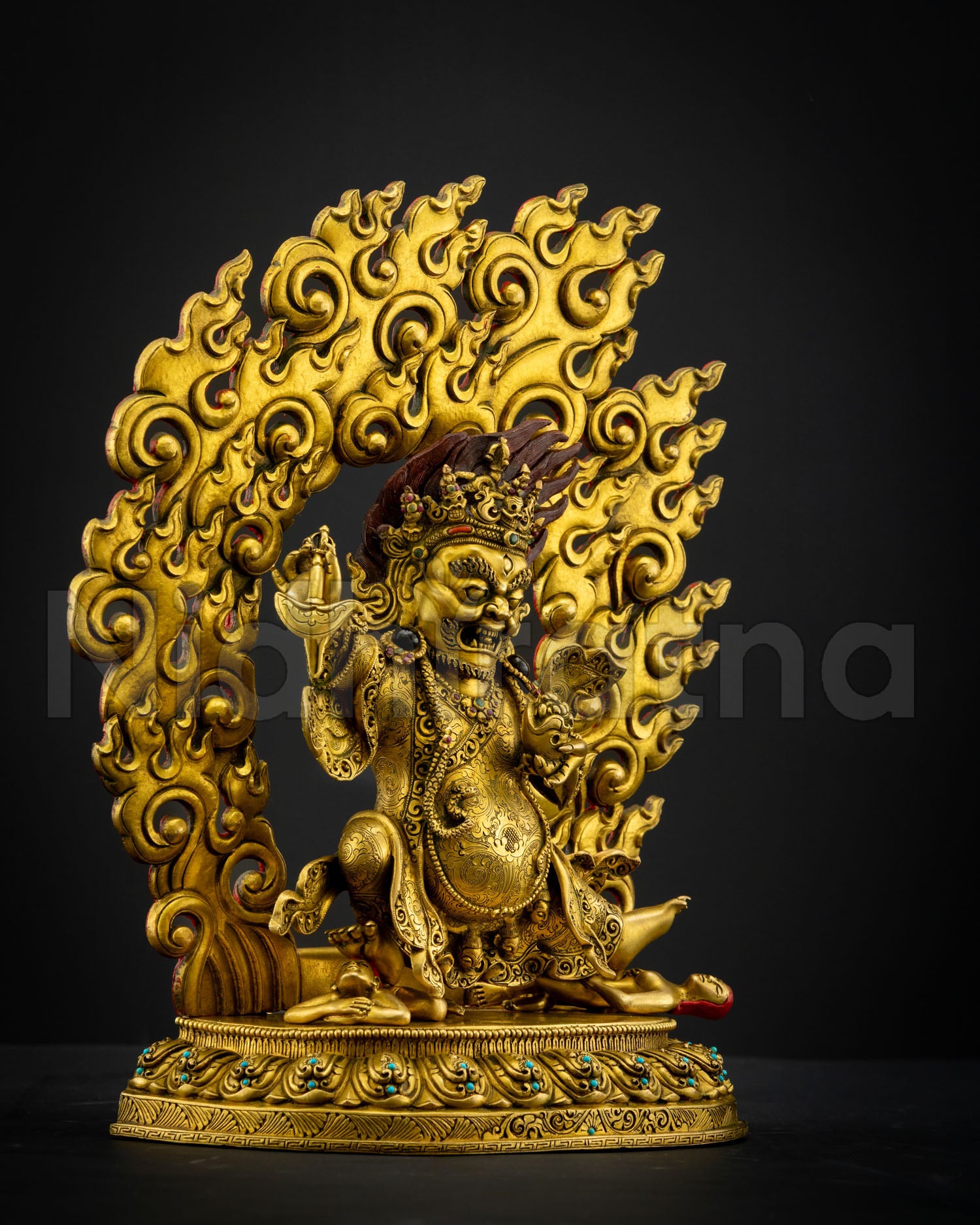 Side view of Mahakala Bernagchen statue with kartika and kapala symbolism