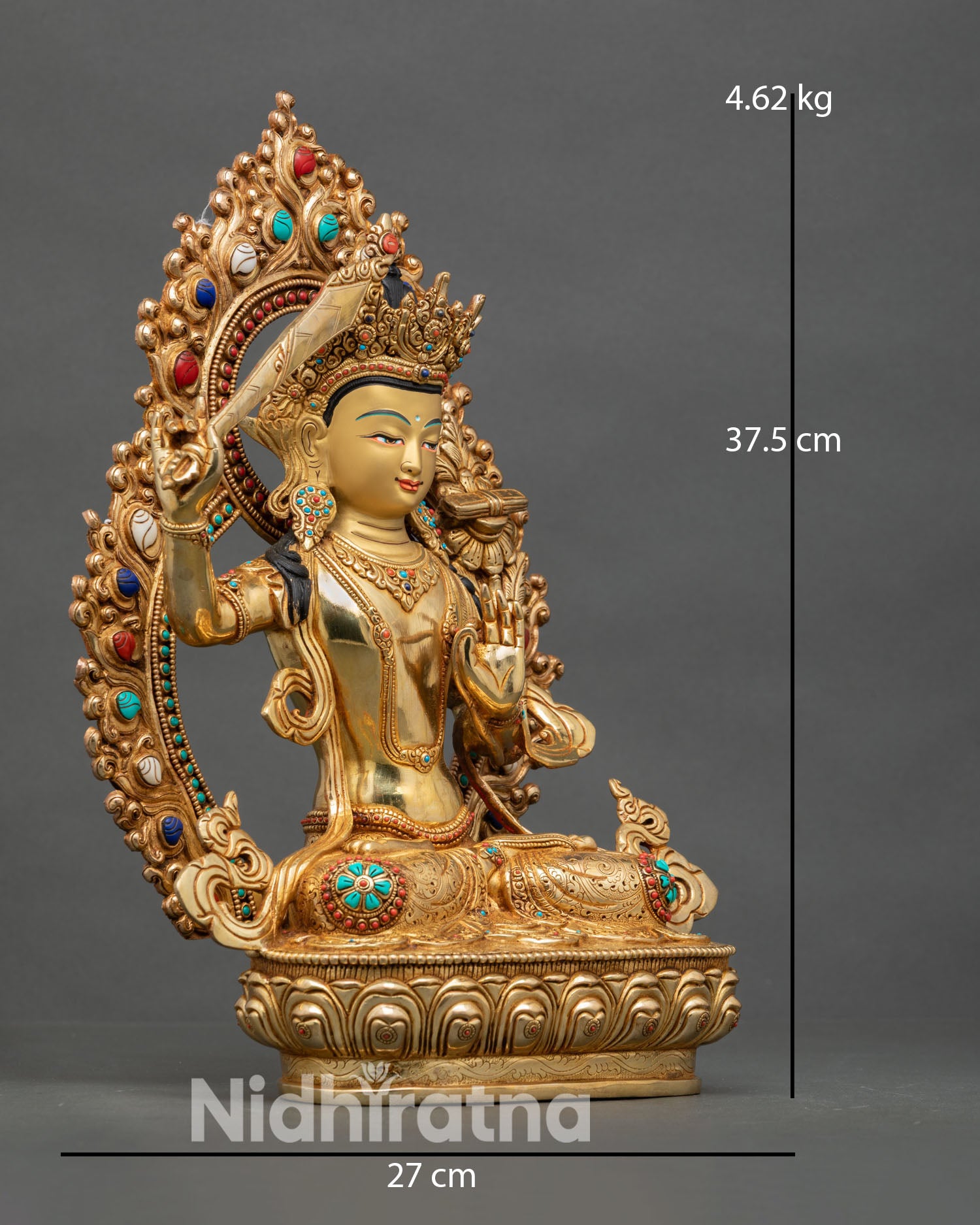 Side view of Manjushri statue, flaming sword of wisdom, Prajnaparamita scripture, lotus seat
