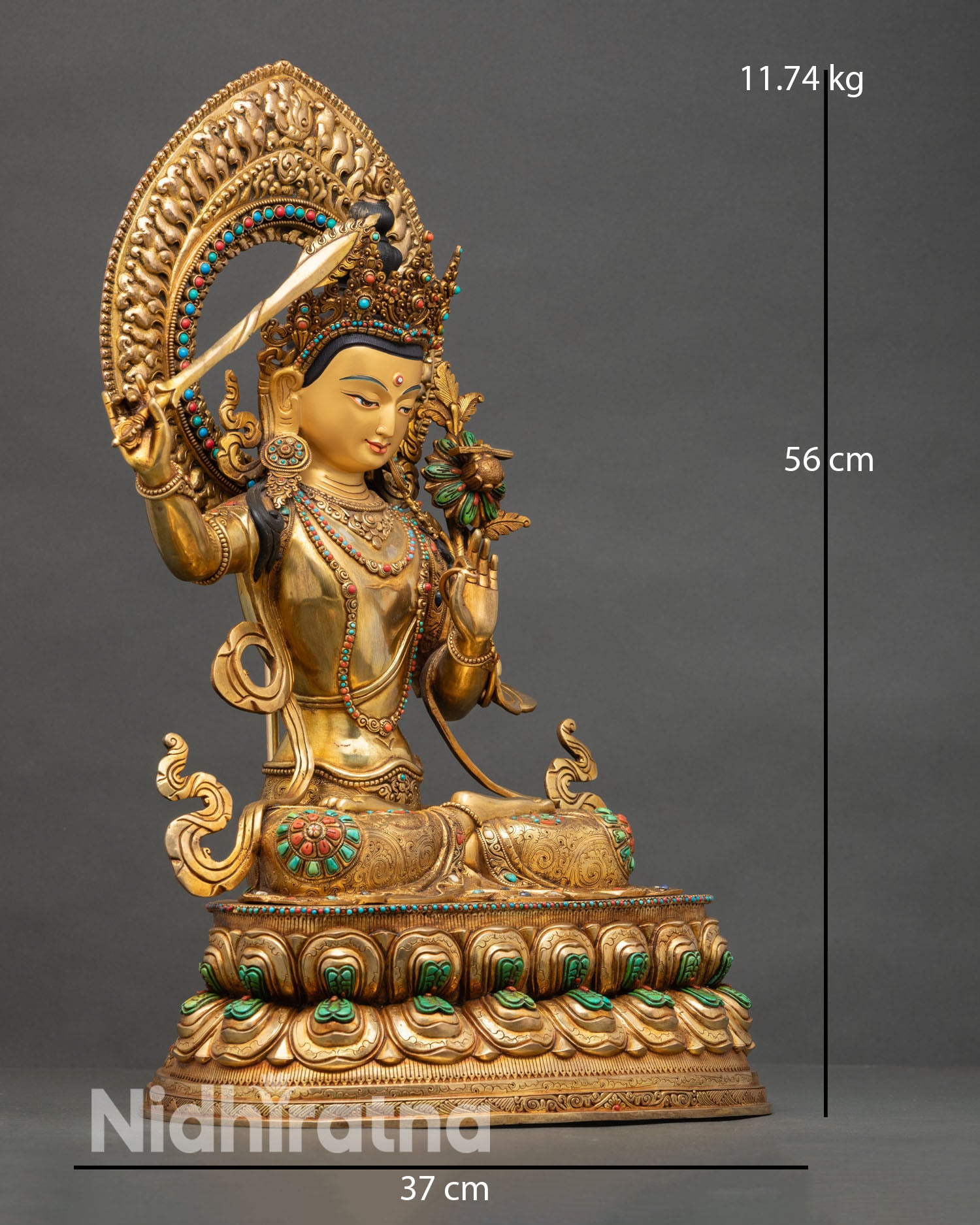 Side view Manjushri statue flaming sword of wisdom utpala flower Prajnaparamita scripture copper gold gilded Vajrayana meditation deity art