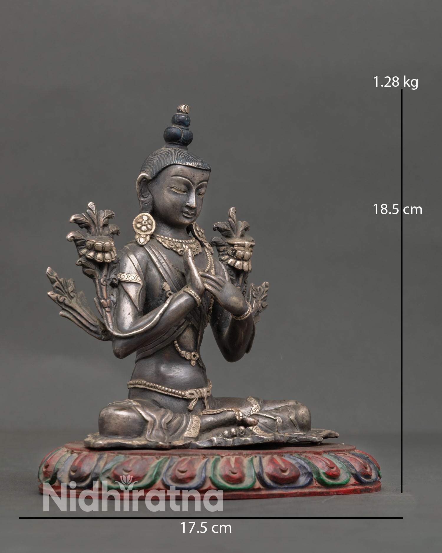 Side view of Chenrezig Bodhisattva statue highlighting hand painted lotus base oxidized copper finish
