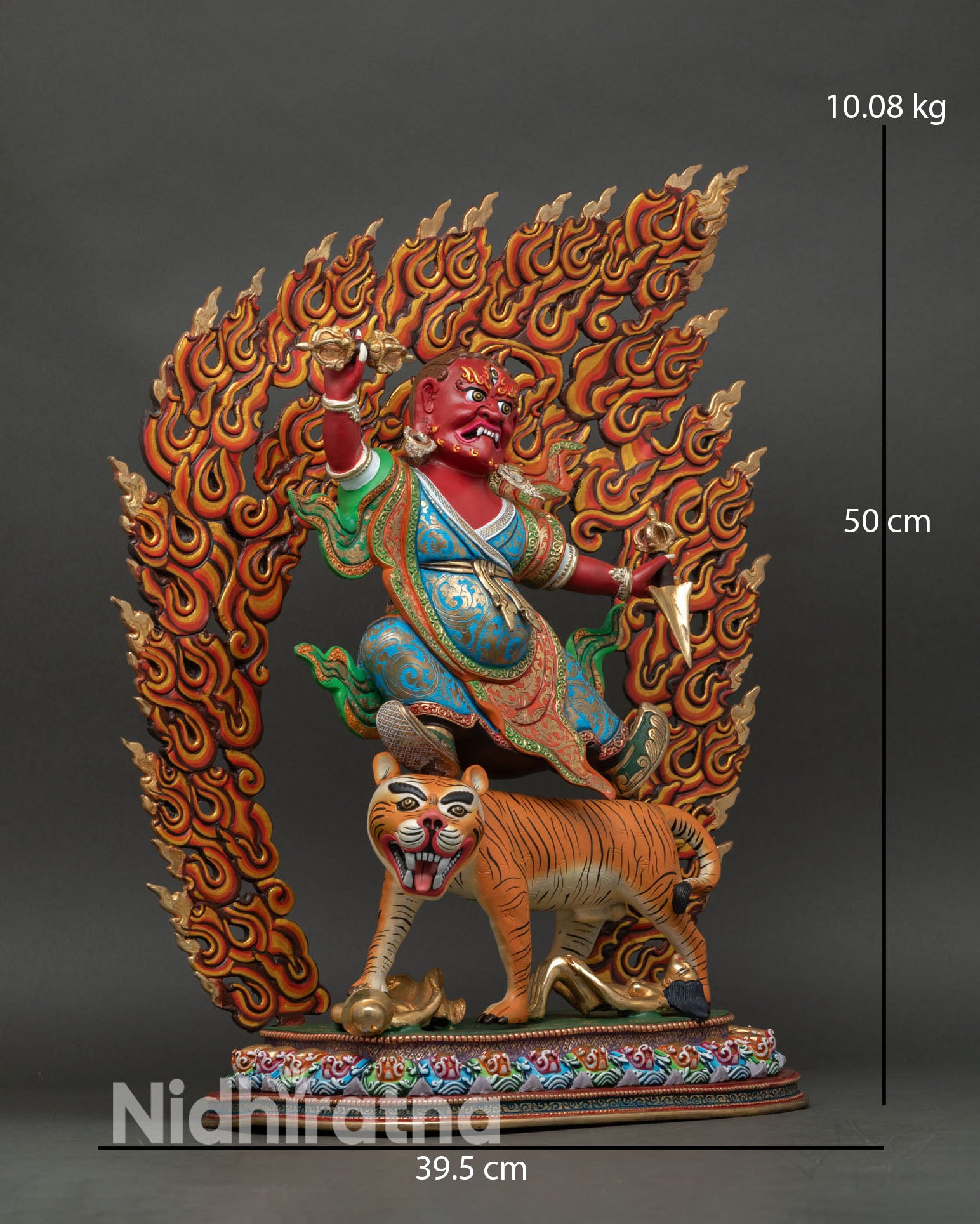 Side view of Dorje Drollo standing on white tigress holding vajra and phurba, sacred sculpture