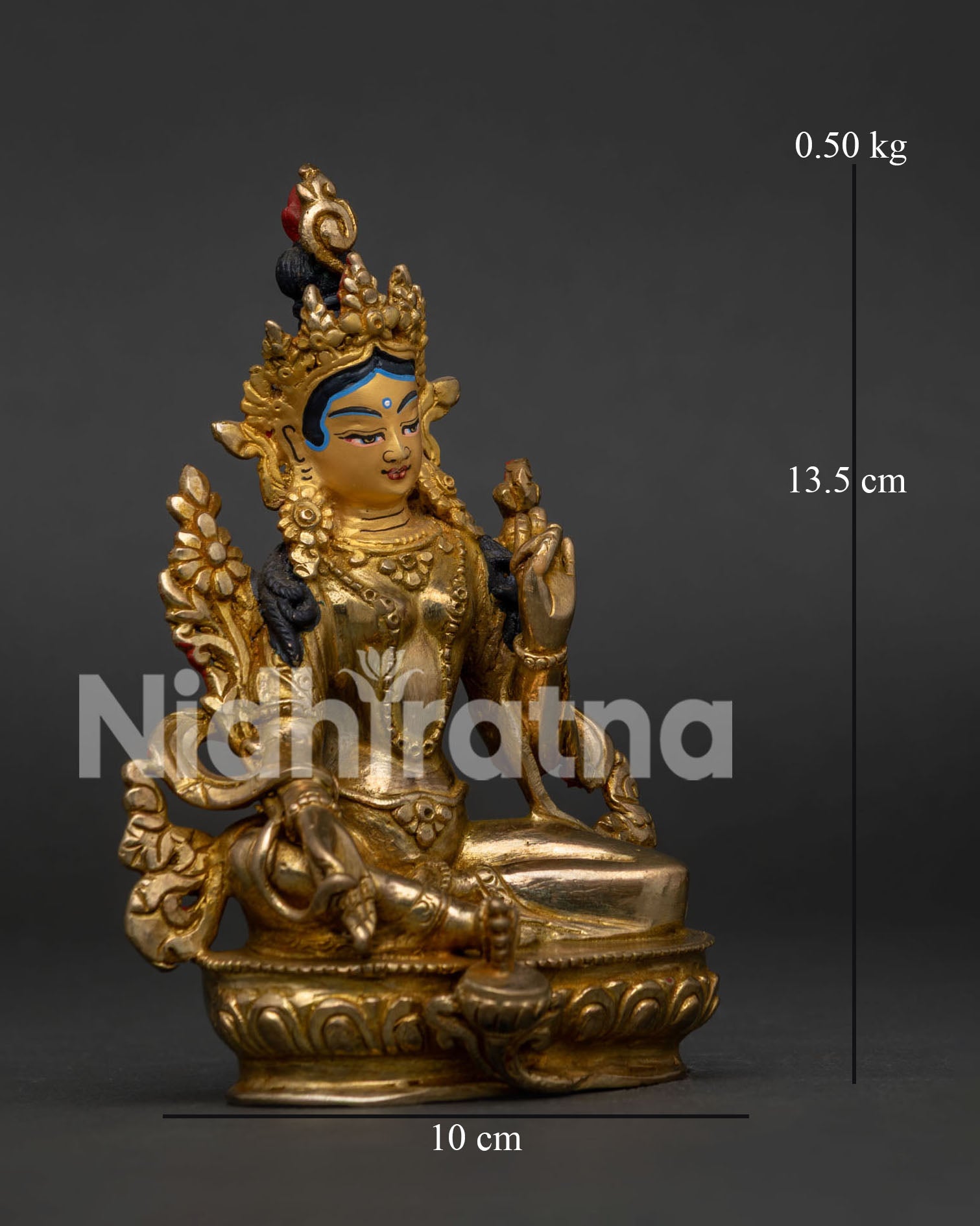 Side view of Green Tara Buddhist statue for meditation altar and spiritual home decor