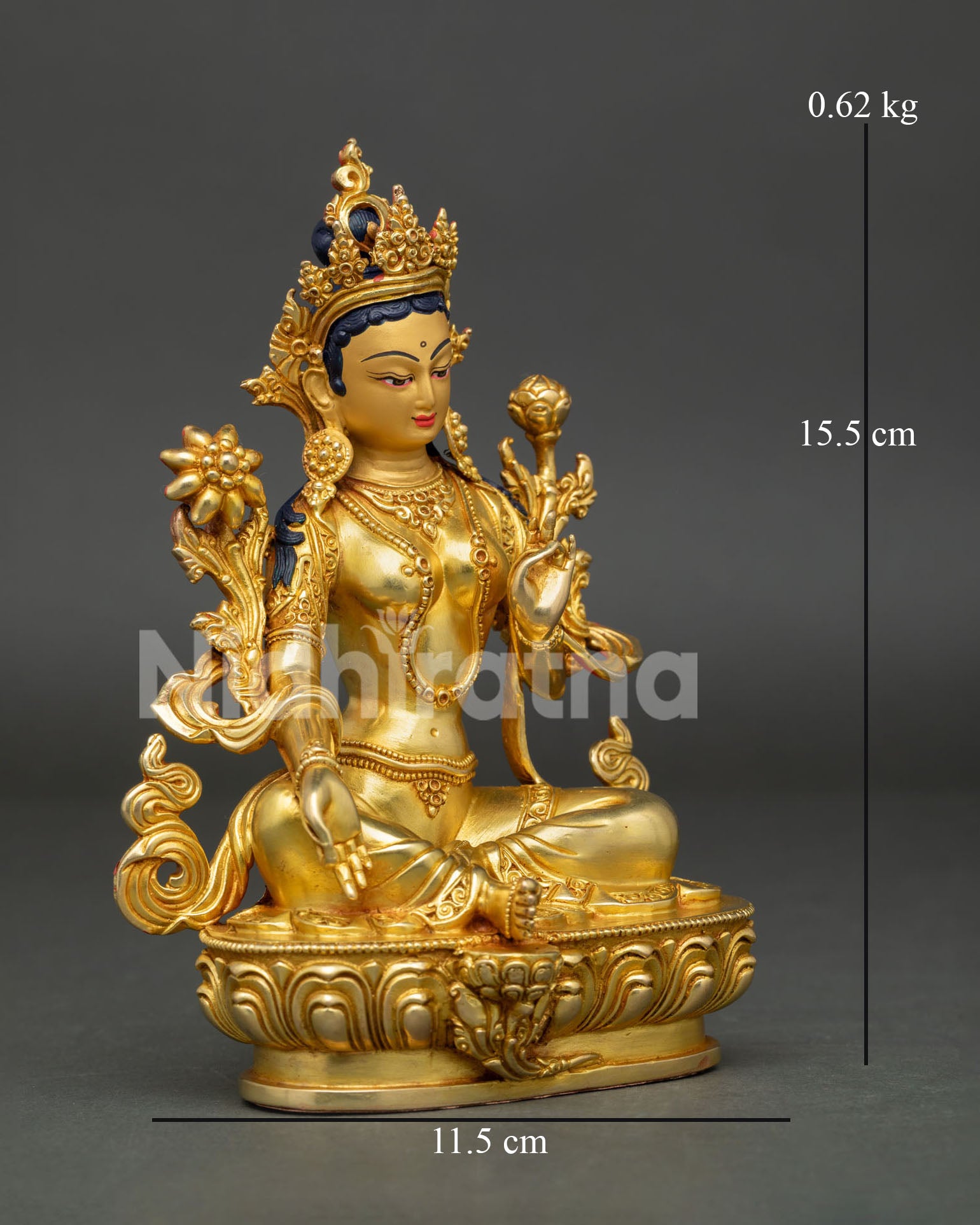 Side view of Green Tara sculpture. featuring lotus pedestal and traditional Newari copper craftsmanship