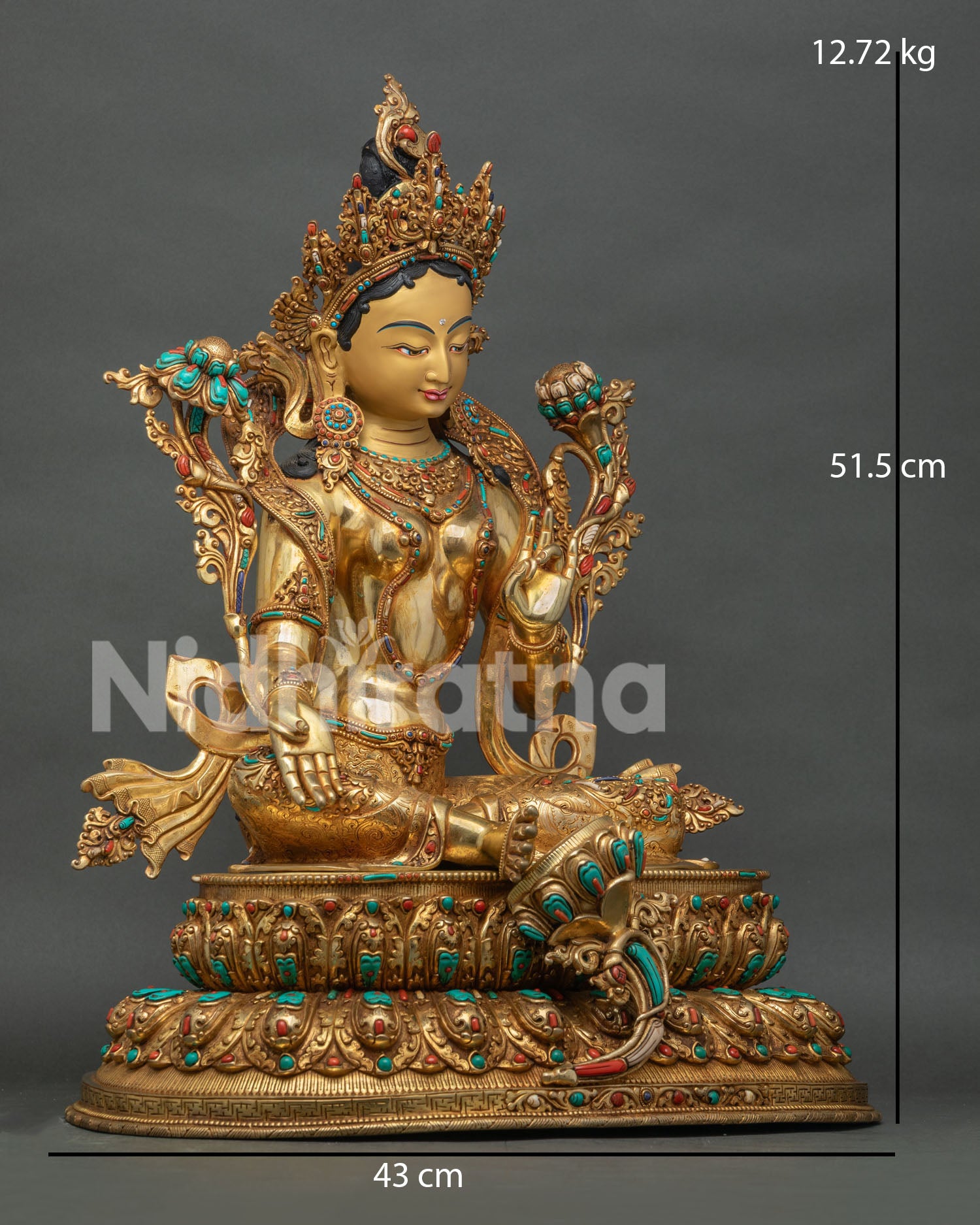 Side view of handcrafted Green Tara statue in 24K gold gilded copper from Nepal