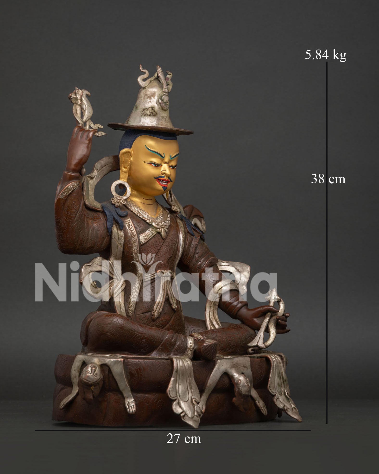 Side View of Himalayan King Gesar Statue Holding Vajra Axe and Bow with Arrows
