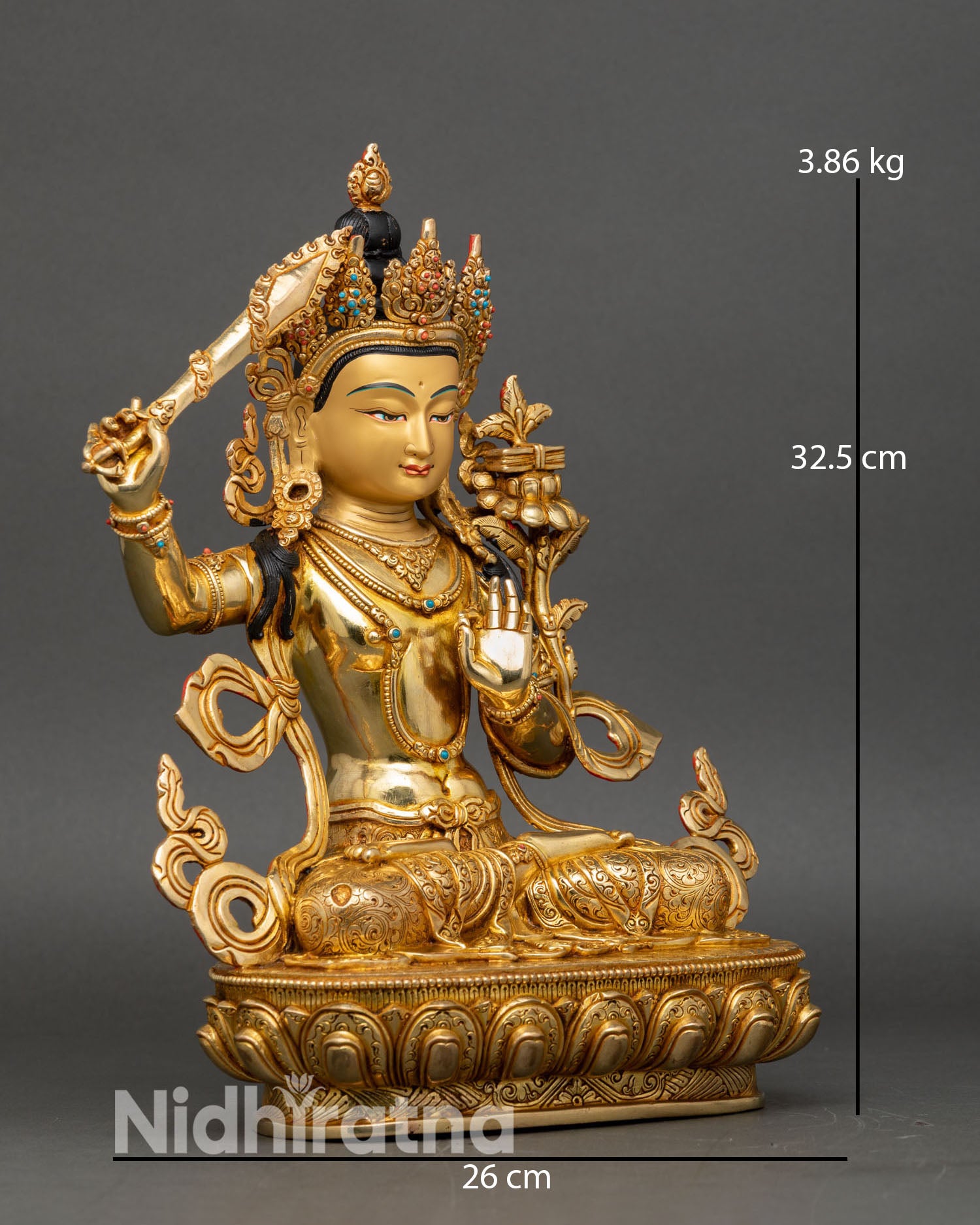 Side view of Manjushri statue double lotus throne Dharmachakra Mudra meditation sacred sculpture