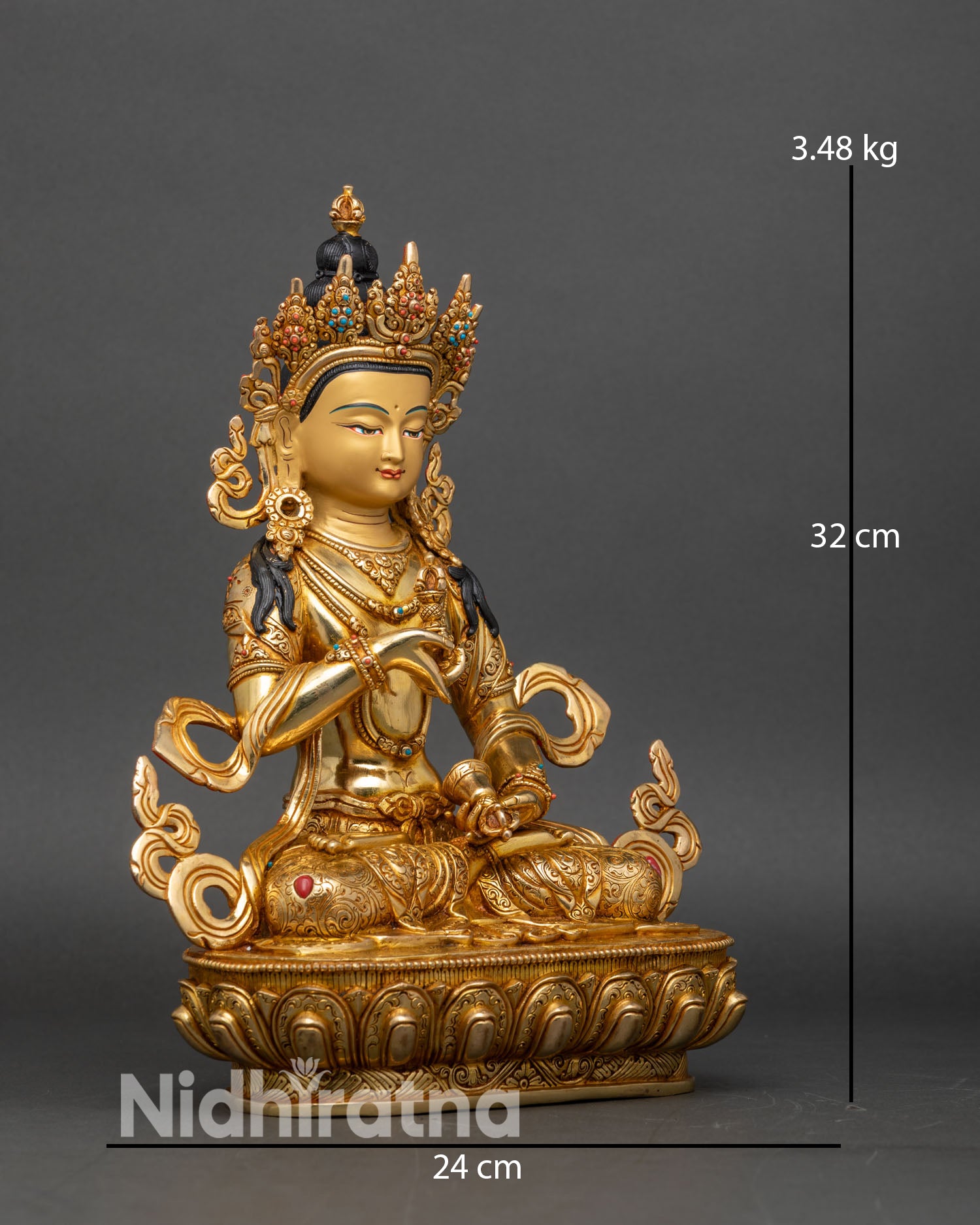 Side view of Nepalese Vajrasattva seated on detailed lotus pedestal with ornaments