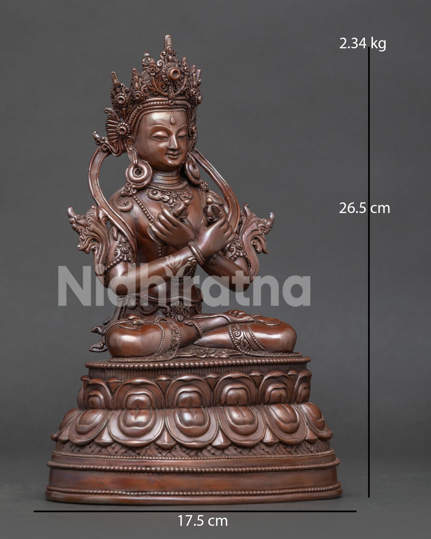 Side view of oxidized copper Vajradhara statue with five jeweled crown